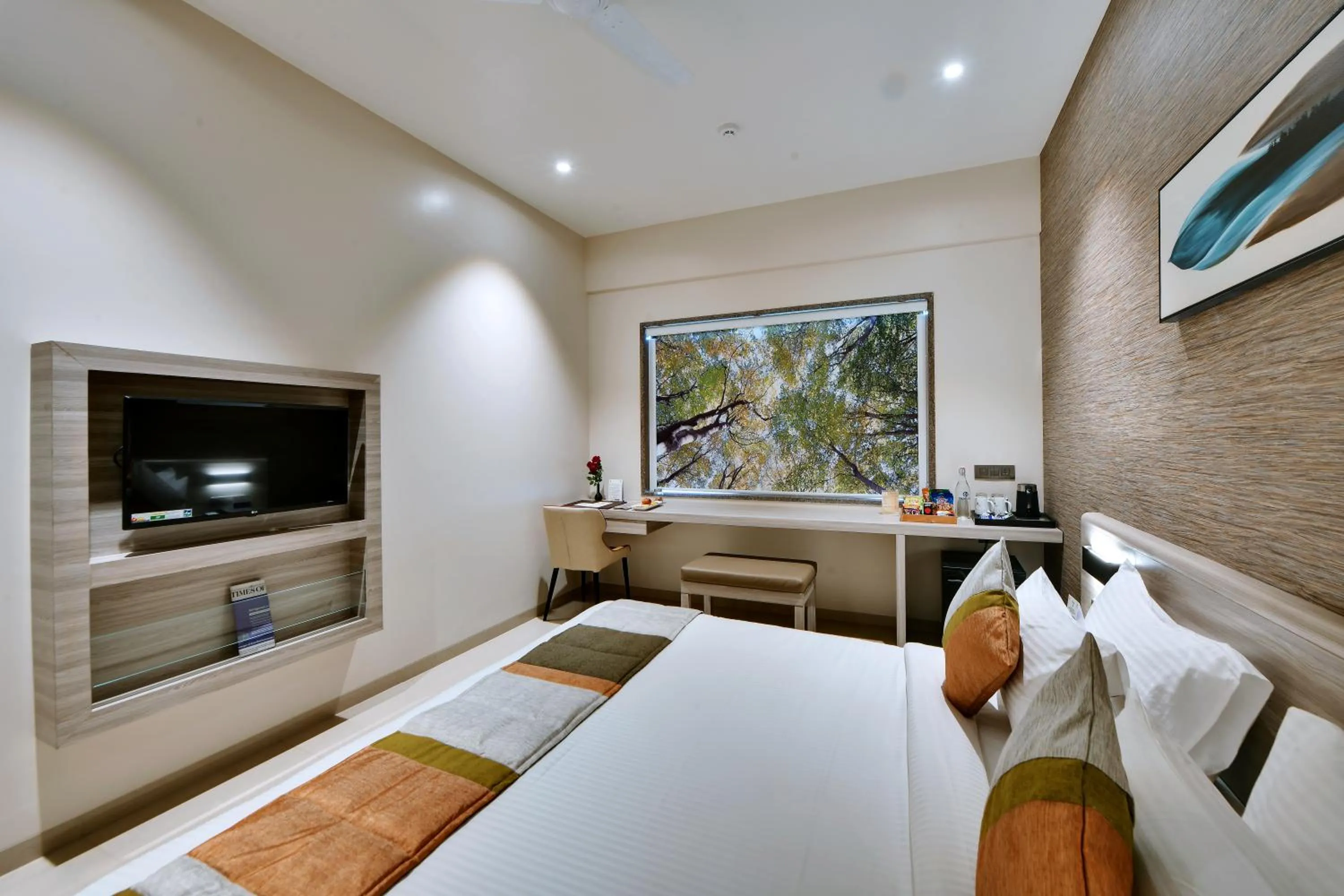 Bed in Click Hotel Pithampur