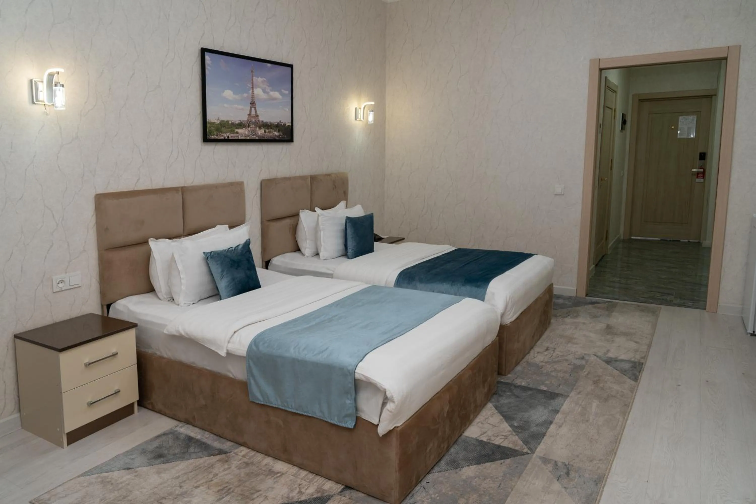 Bed in The Tower Hotel Tashkent by HotelPro Group