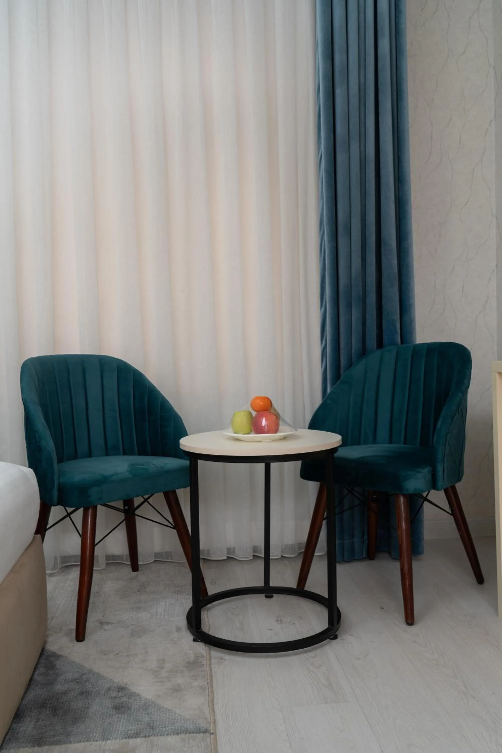 Seating area in The Tower Hotel Tashkent by HotelPro Group