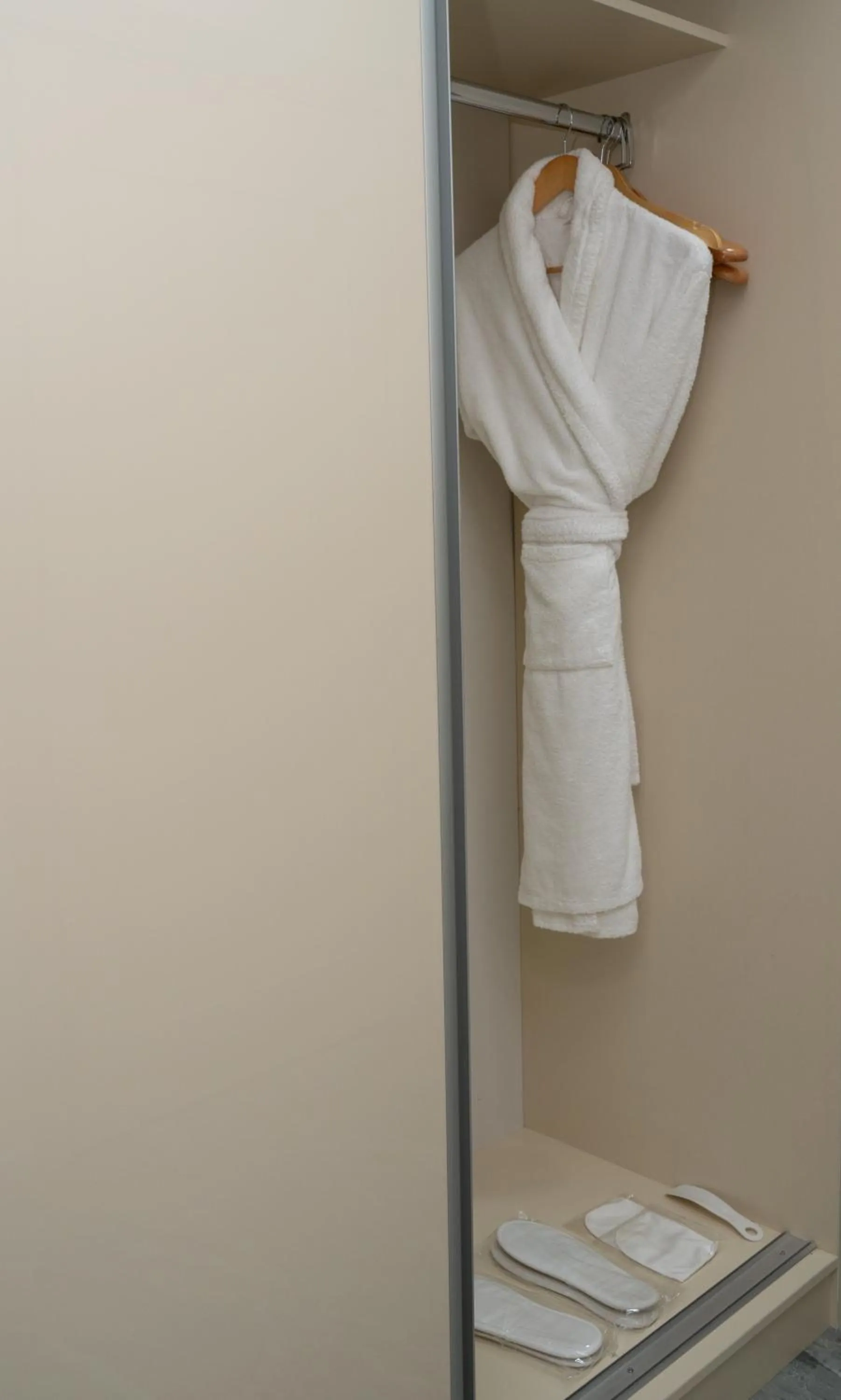 wardrobe in The Tower Hotel Tashkent by HotelPro Group