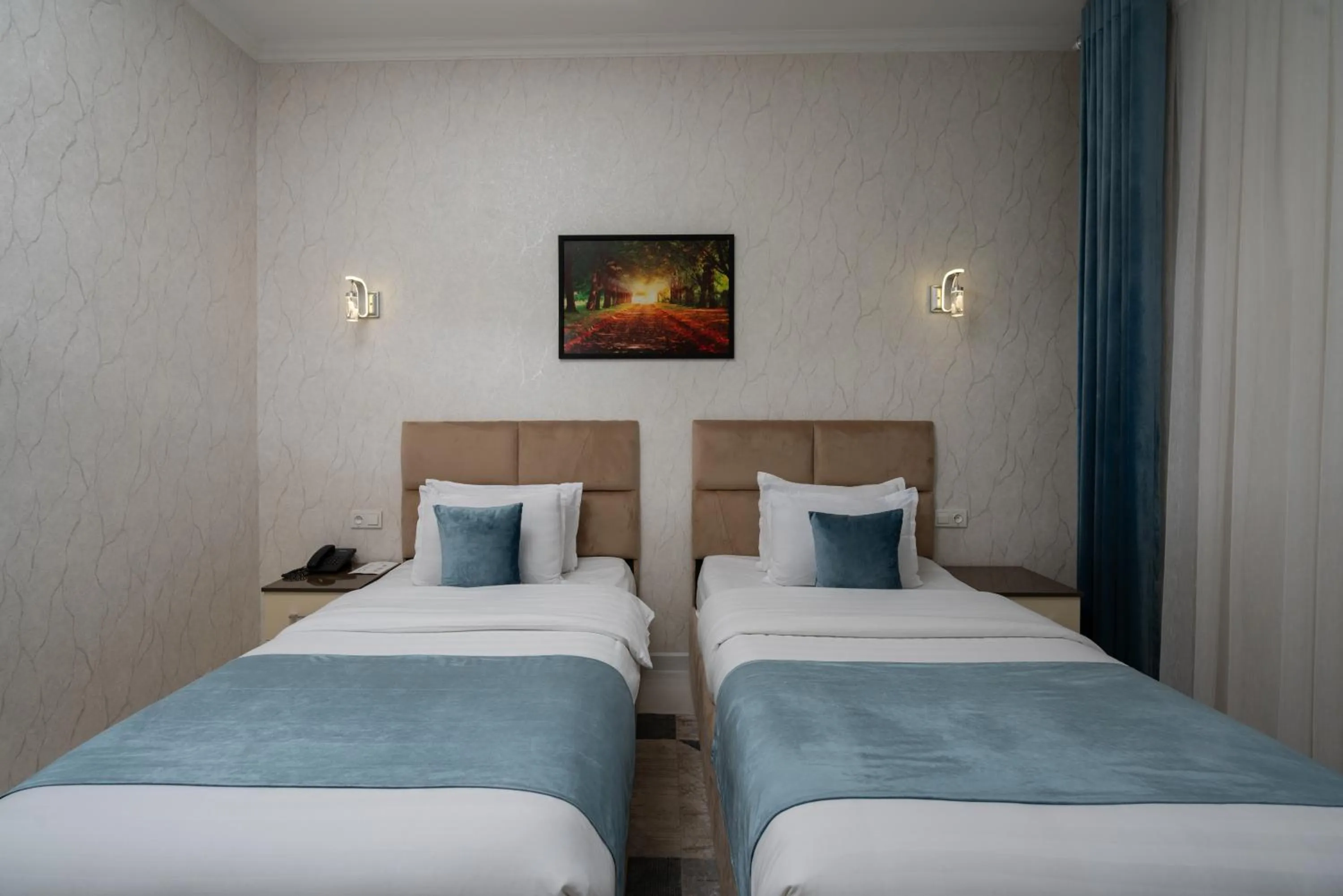 Bed in The Tower Hotel Tashkent by HotelPro Group