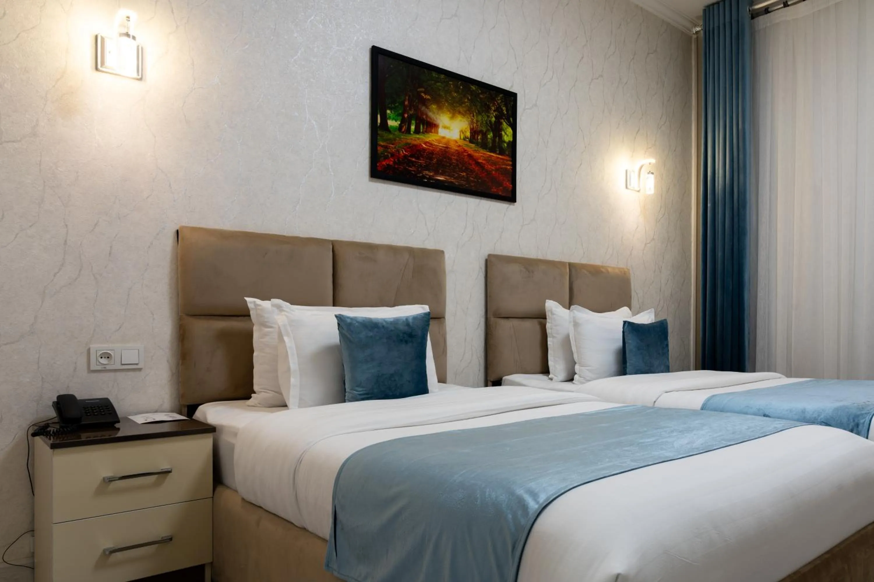 Bed in The Tower Hotel Tashkent by HotelPro Group