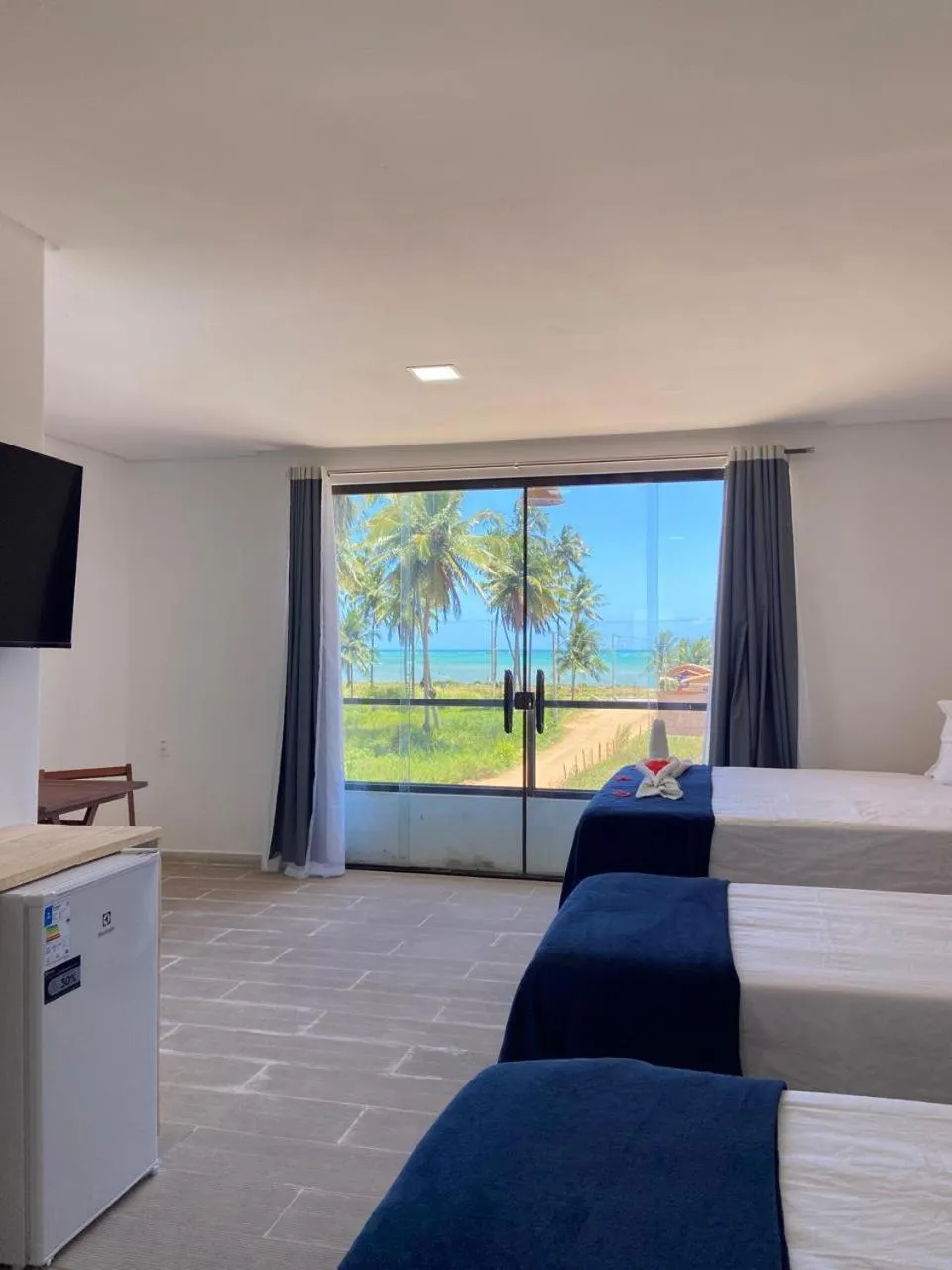 Bed in Pousada Canouan