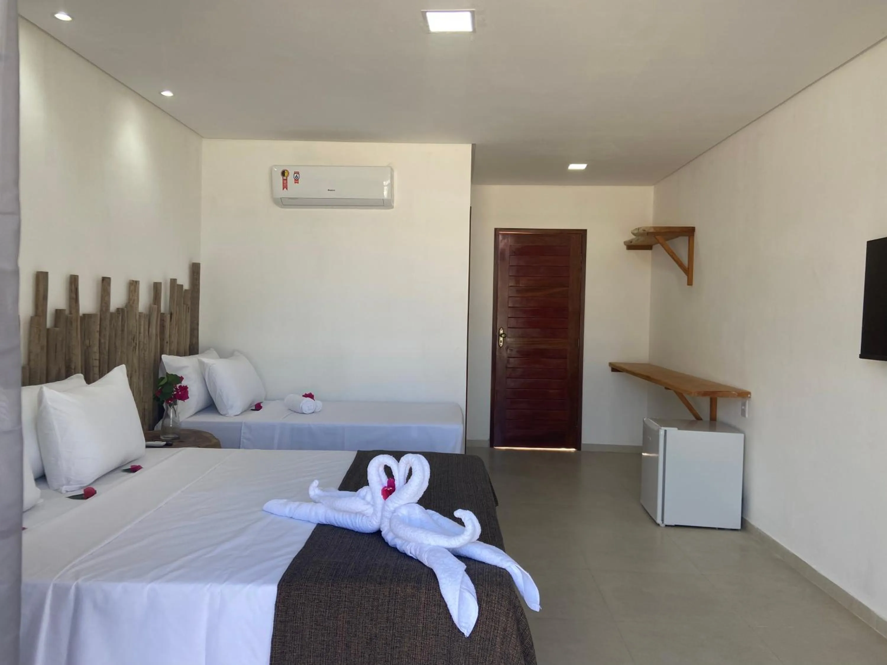 Bed in Pousada Canouan