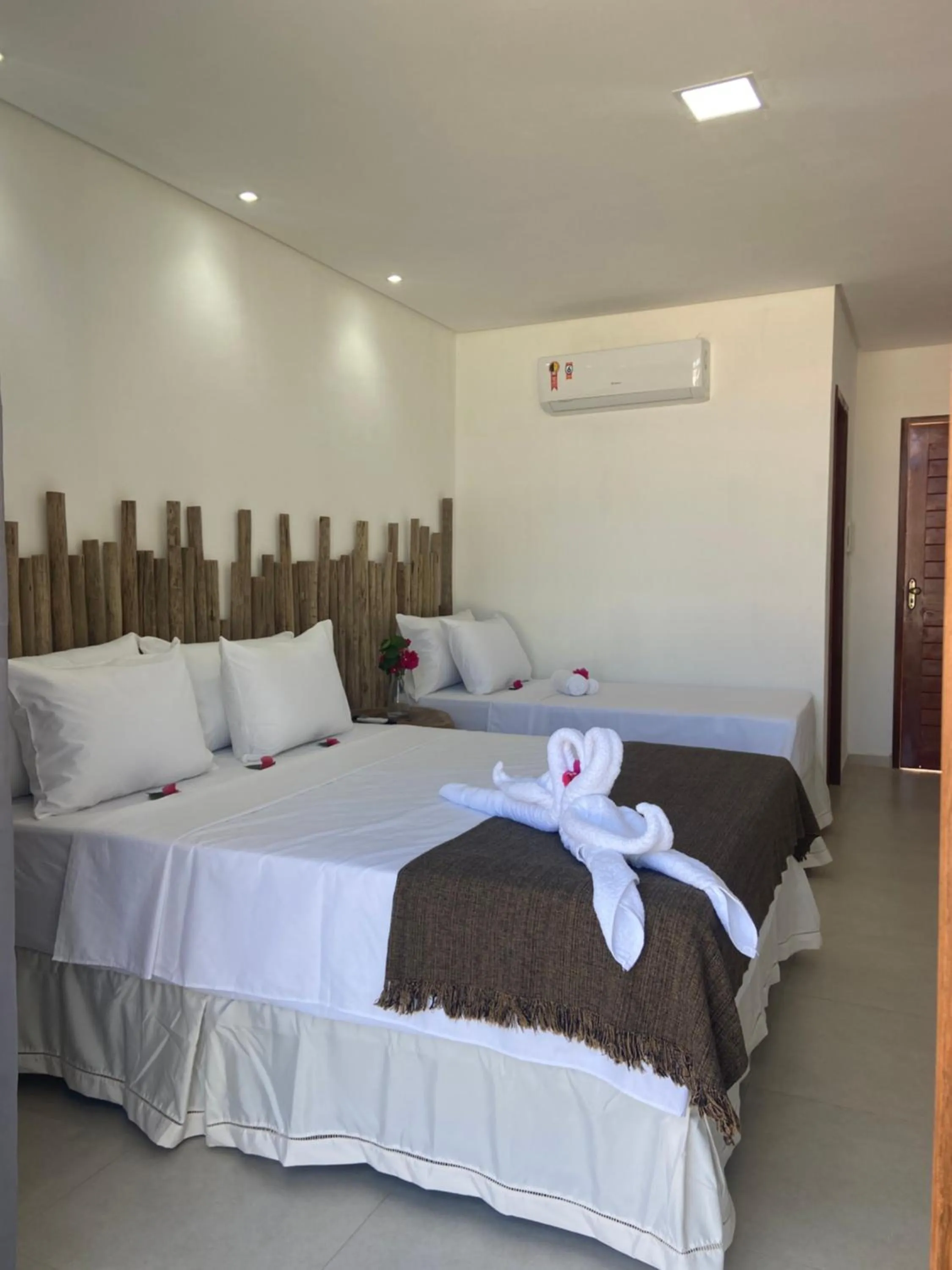 Bed in Pousada Canouan