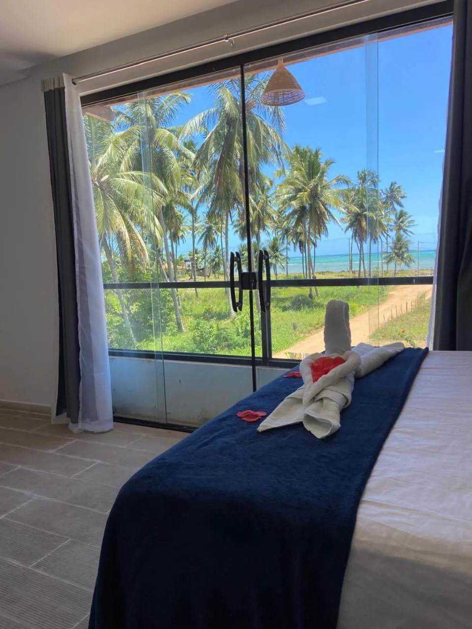 Bed in Pousada Canouan