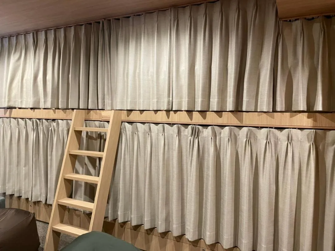 Bed in THE BONDS HOTEL TOKYO