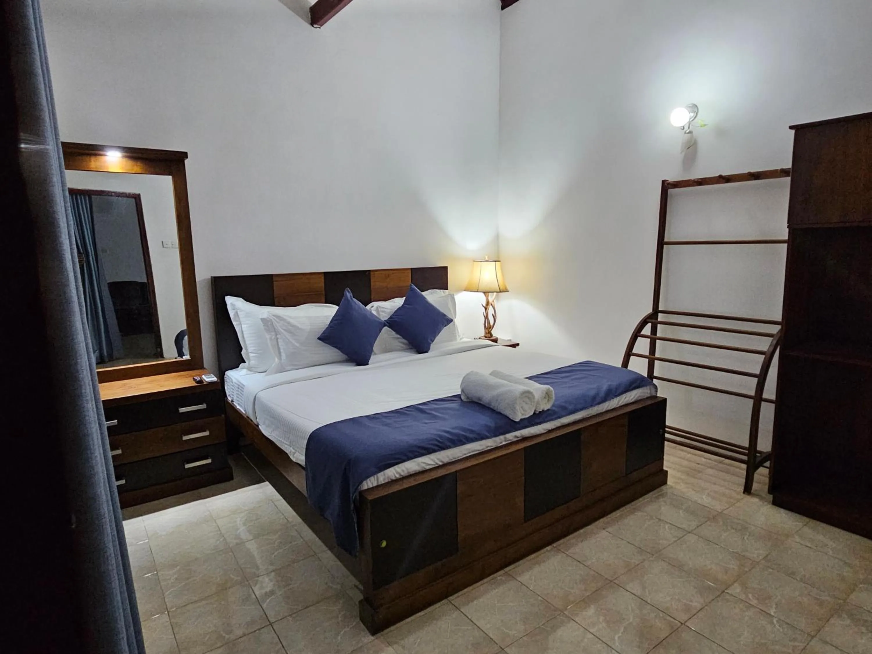 Bed in Ellakanda Nature Villa