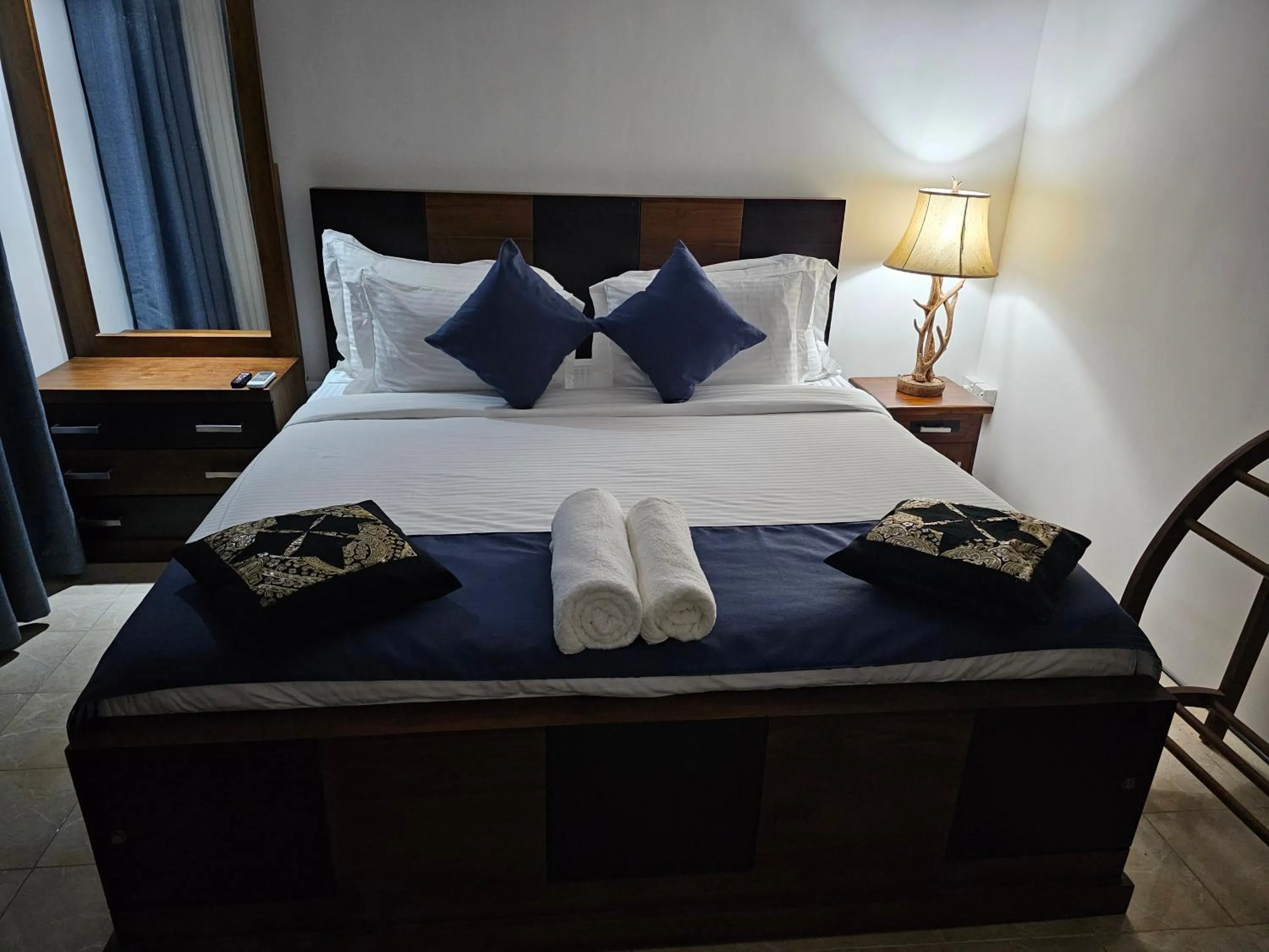 Bed in Ellakanda Nature Villa