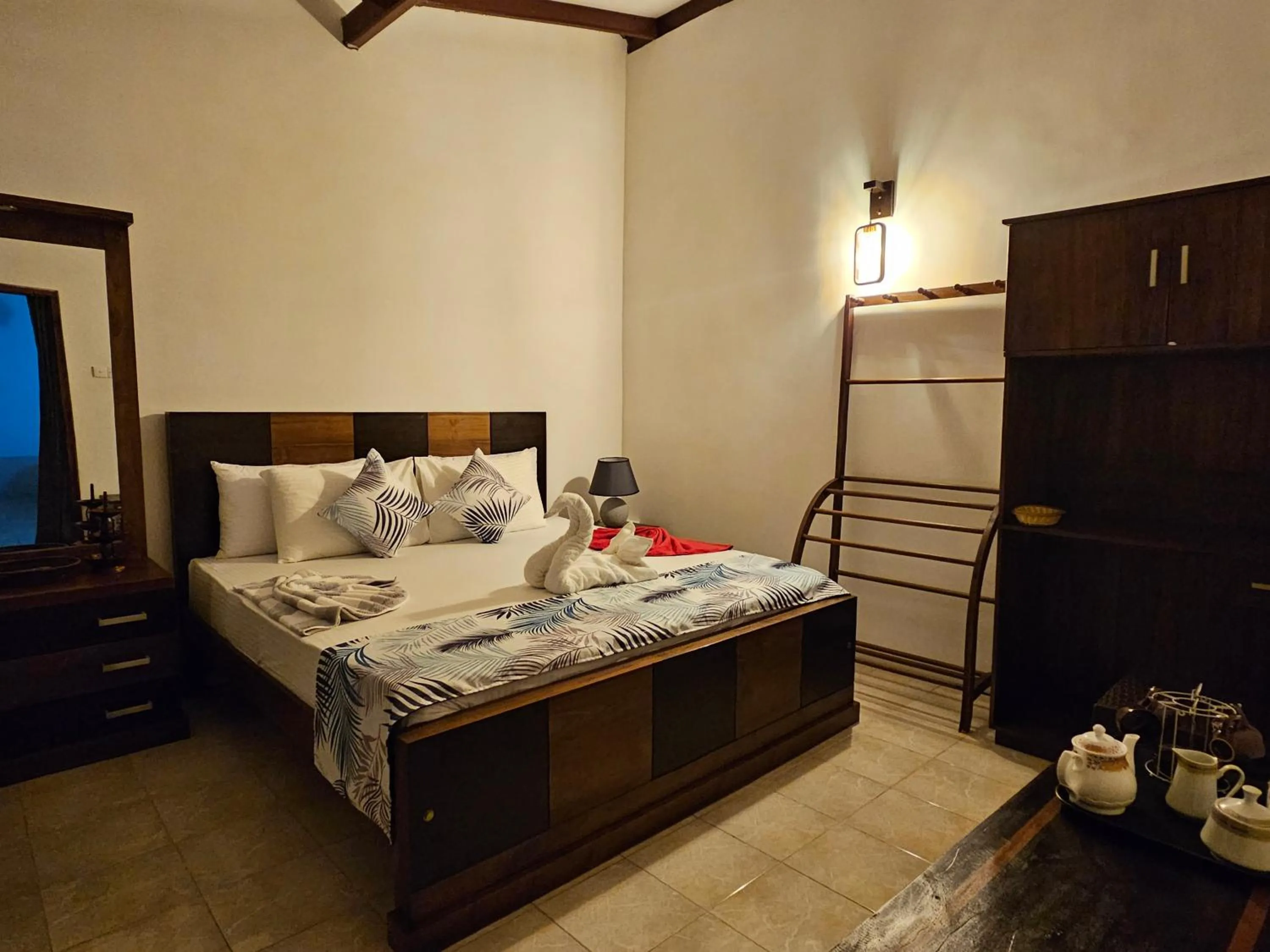 Bed in Ellakanda Nature Villa