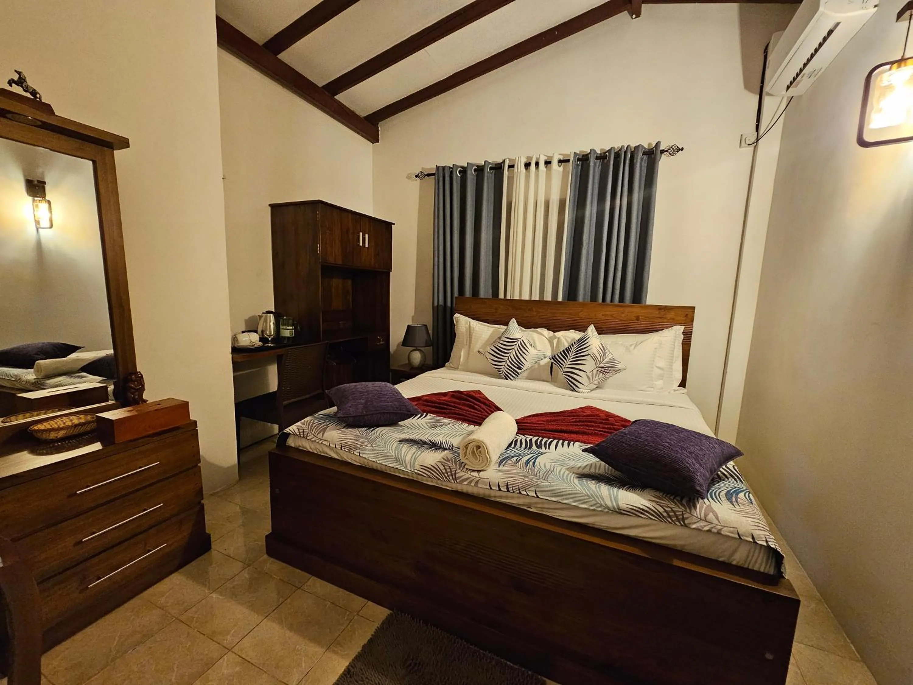 Bed in Ellakanda Nature Villa