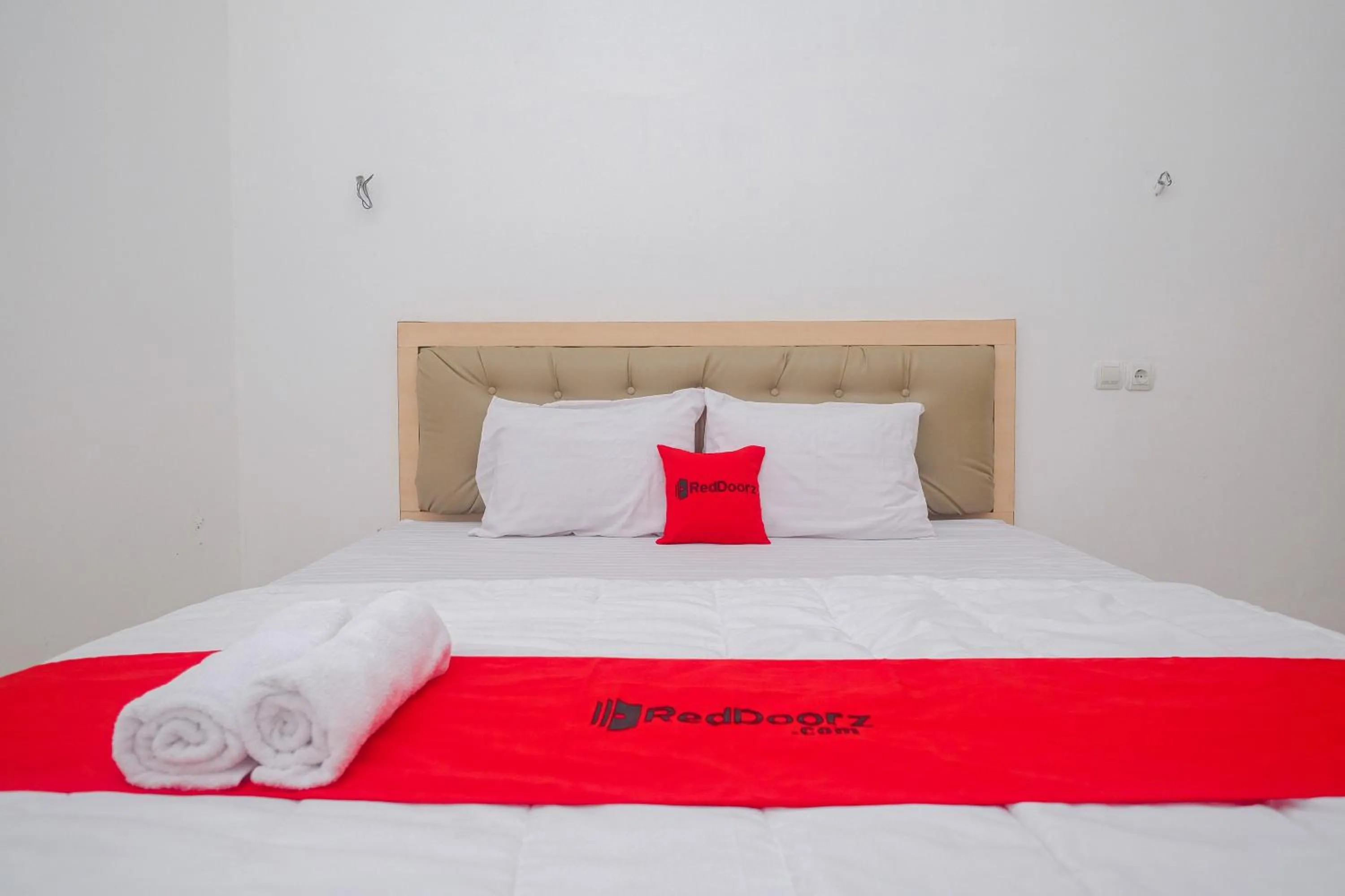 Bed in RedDoorz Syariah near Alun Alun Temanggung
