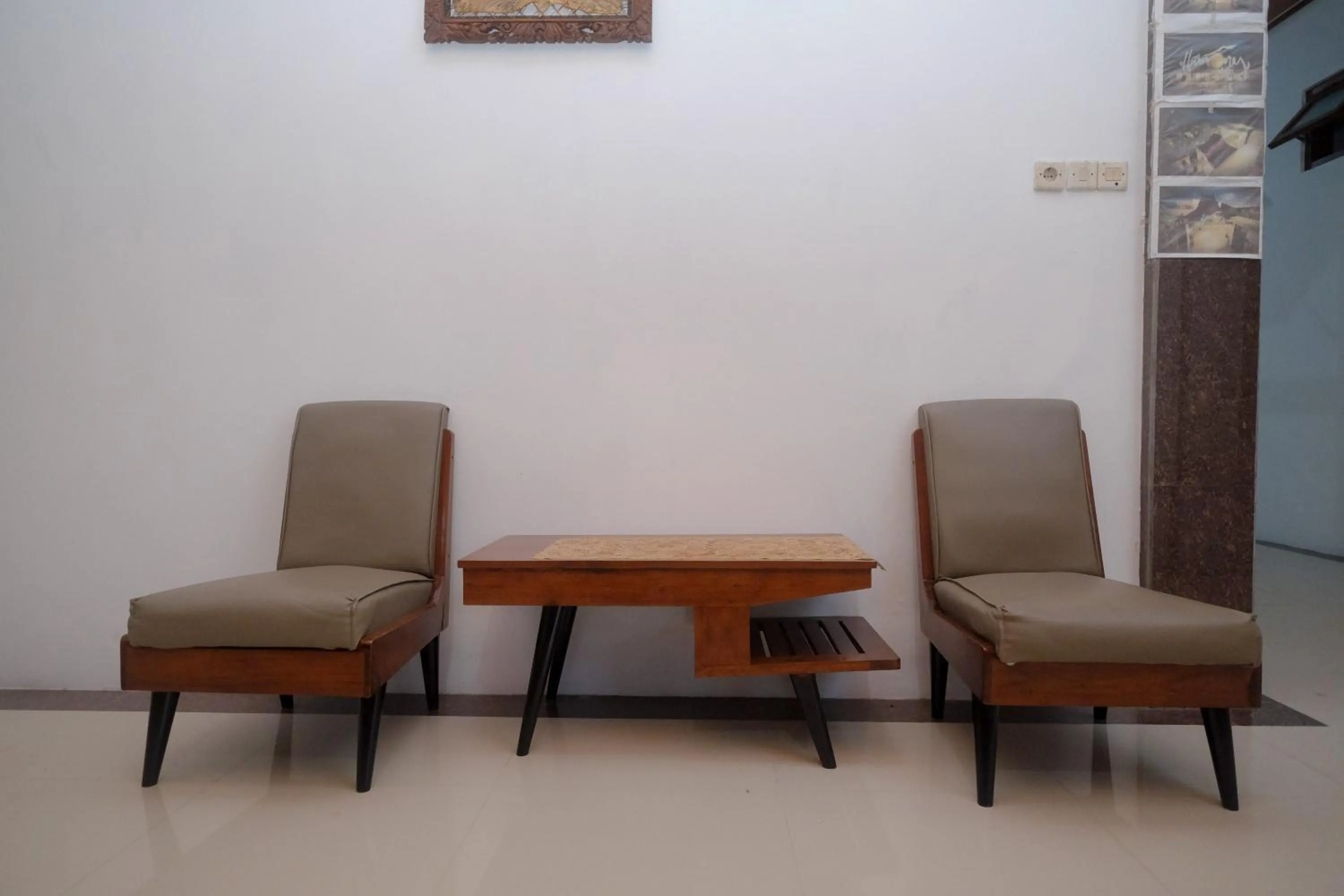 Seating area in RedDoorz Syariah near Alun Alun Temanggung