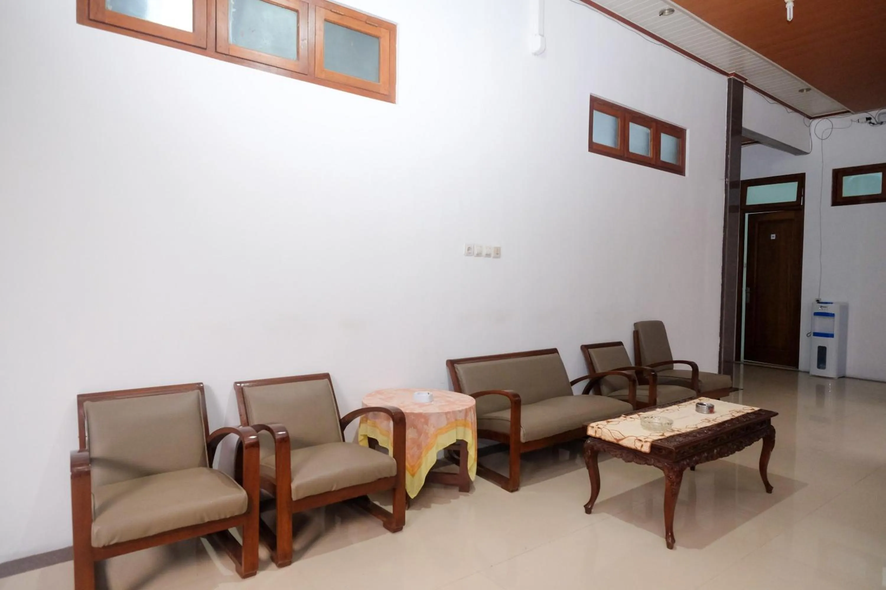 Seating area in RedDoorz Syariah near Alun Alun Temanggung