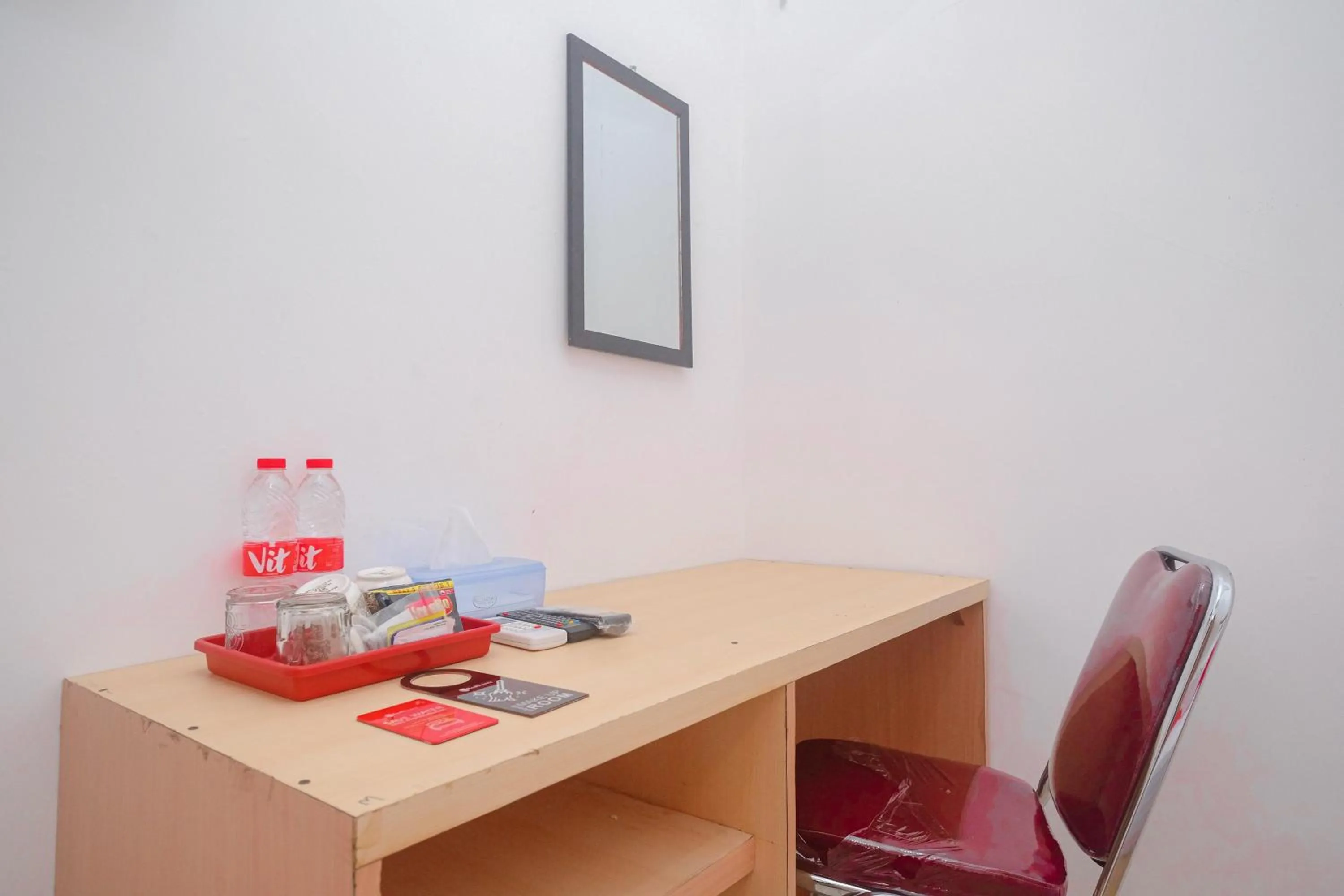 Seating area in RedDoorz Syariah near Alun Alun Temanggung