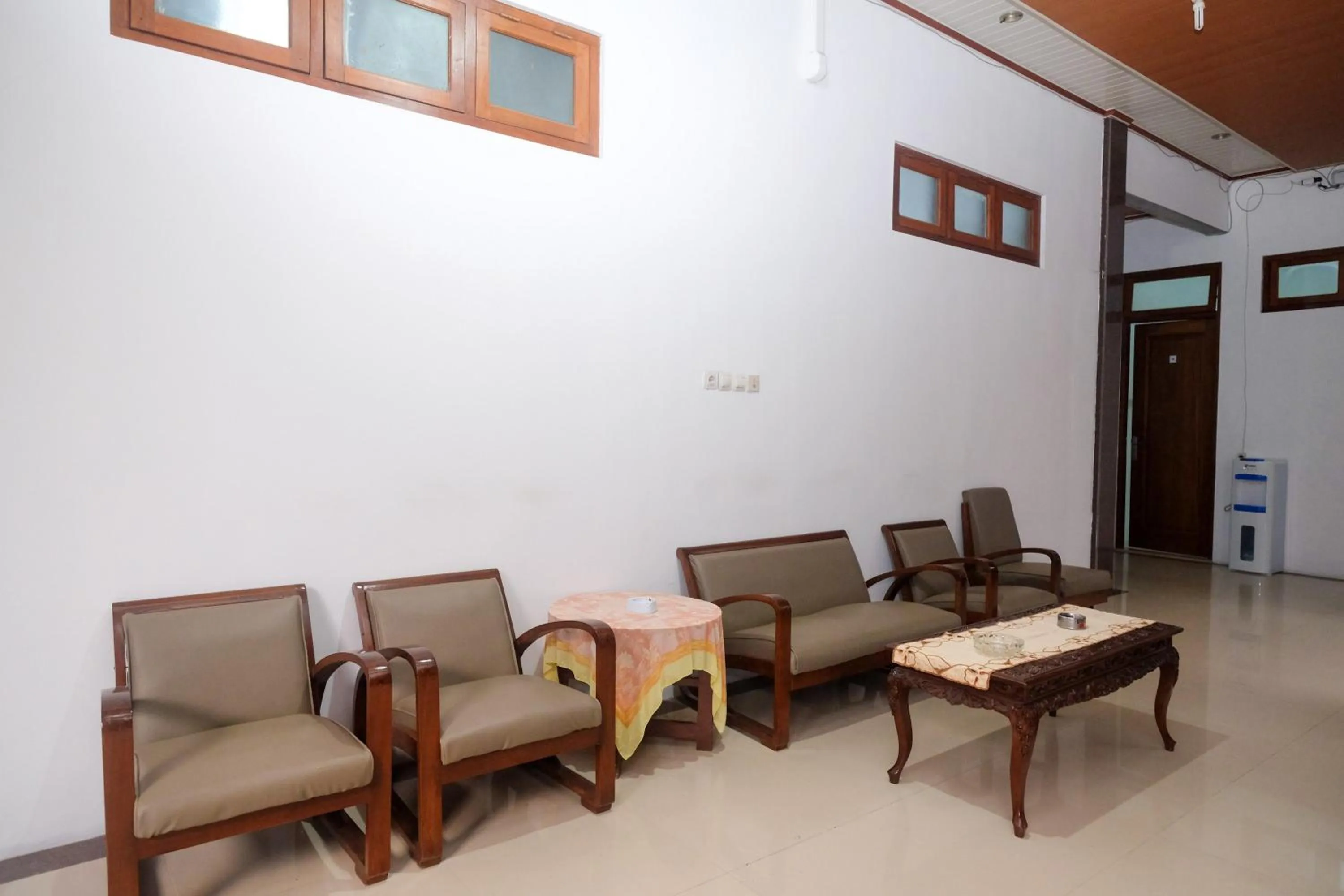 Seating area in RedDoorz Syariah near Alun Alun Temanggung