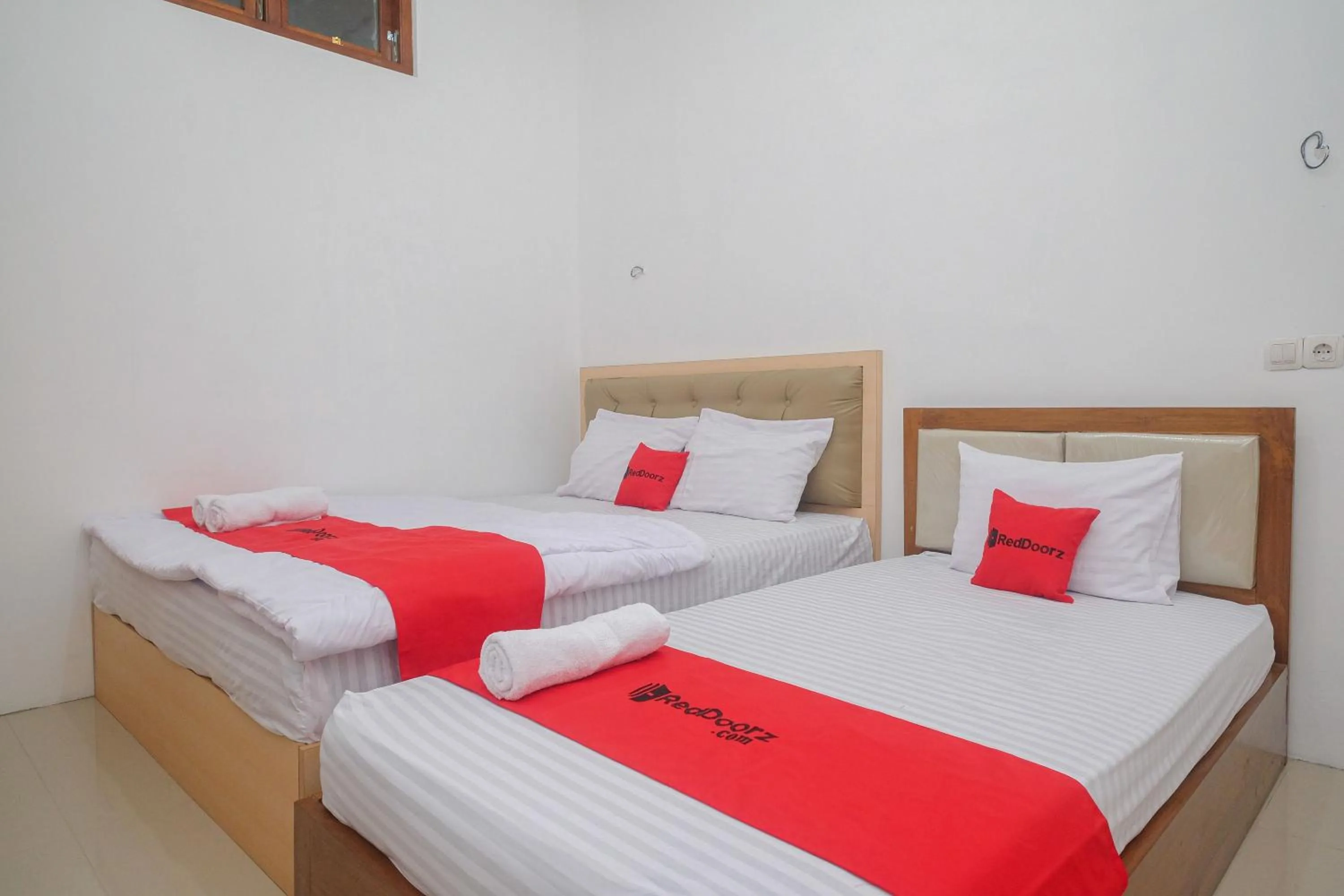 Bed in RedDoorz Syariah near Alun Alun Temanggung