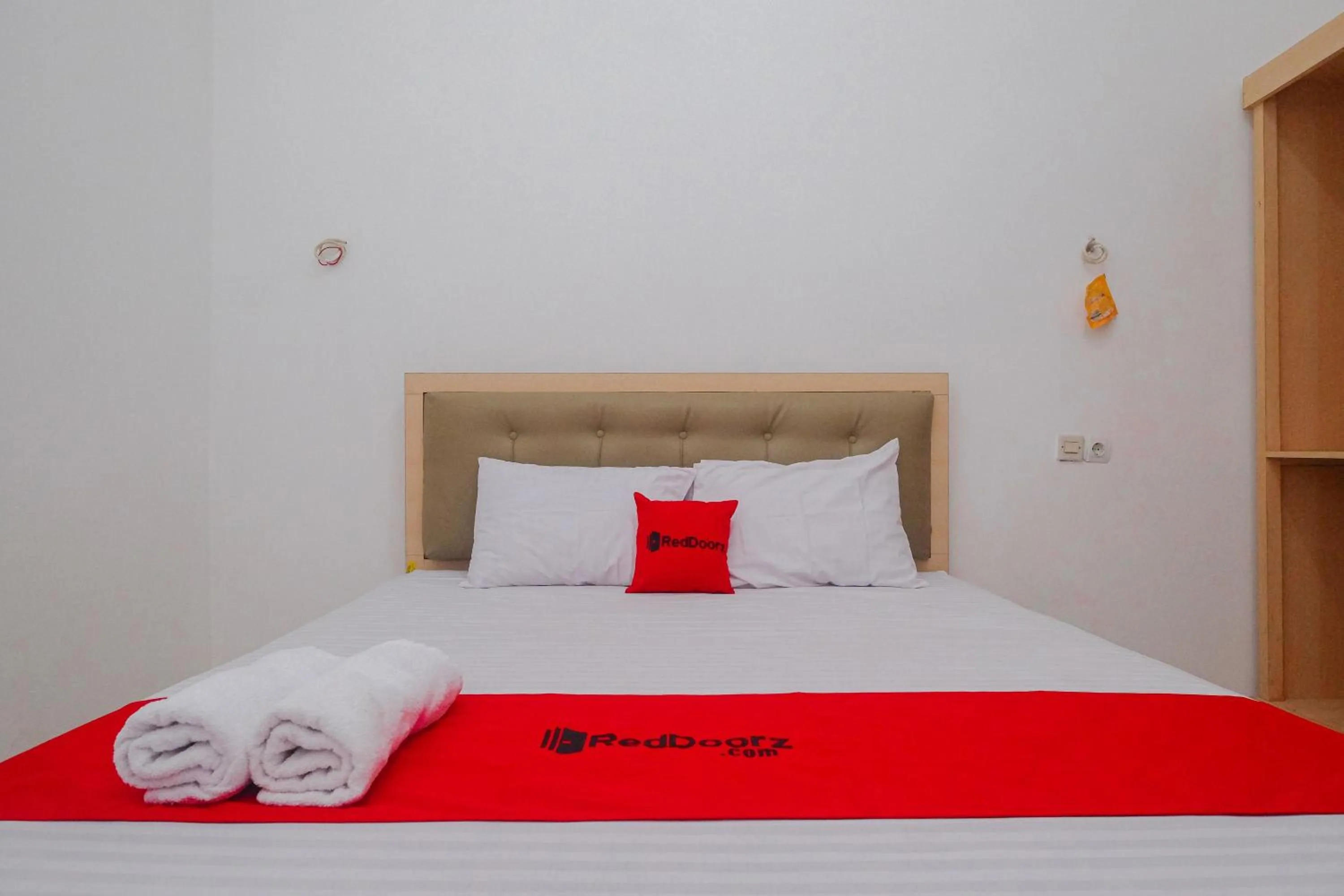 Bed in RedDoorz Syariah near Alun Alun Temanggung