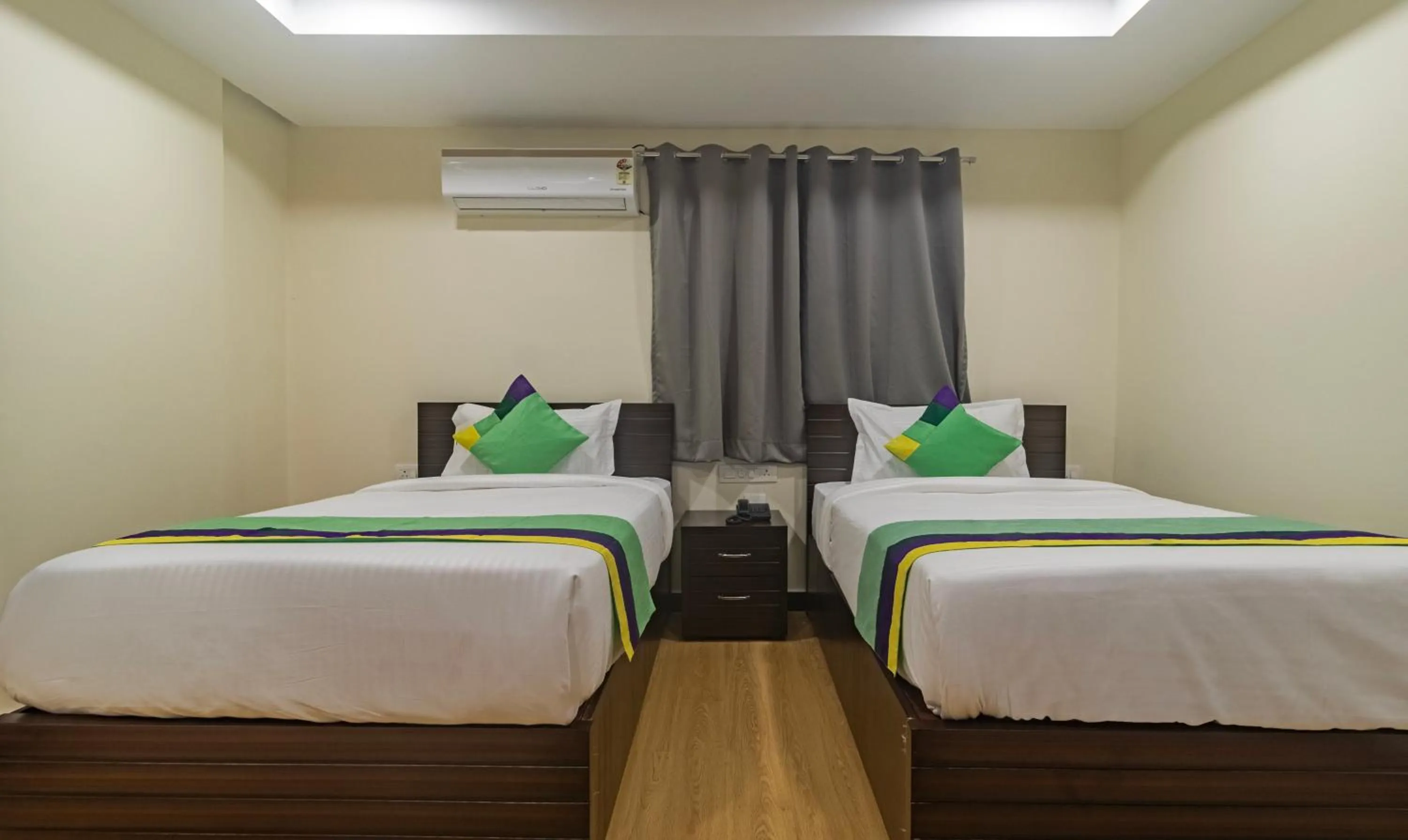 Bed in Treebo Address Inn Jubilee Hills