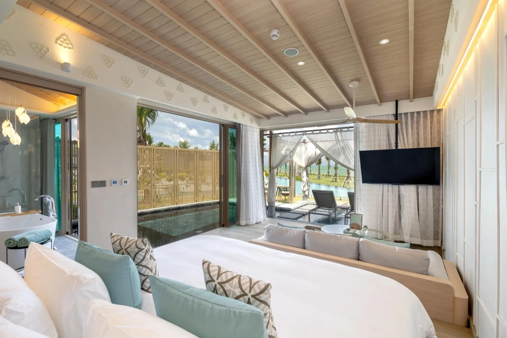 Bed in The Little Shore Khao Lak by Katathani