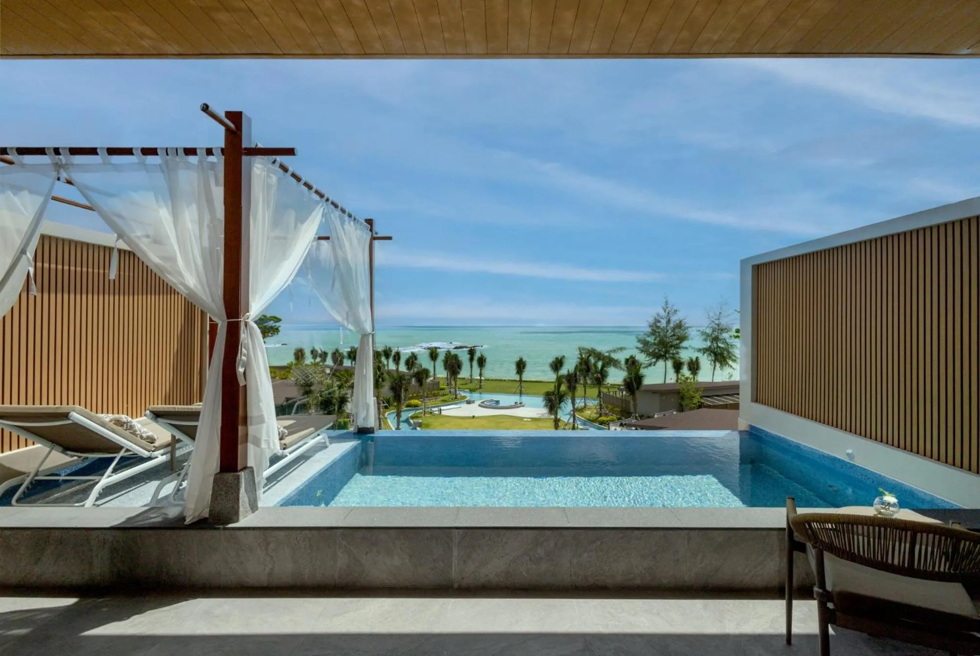Pool view in The Little Shore Khao Lak by Katathani
