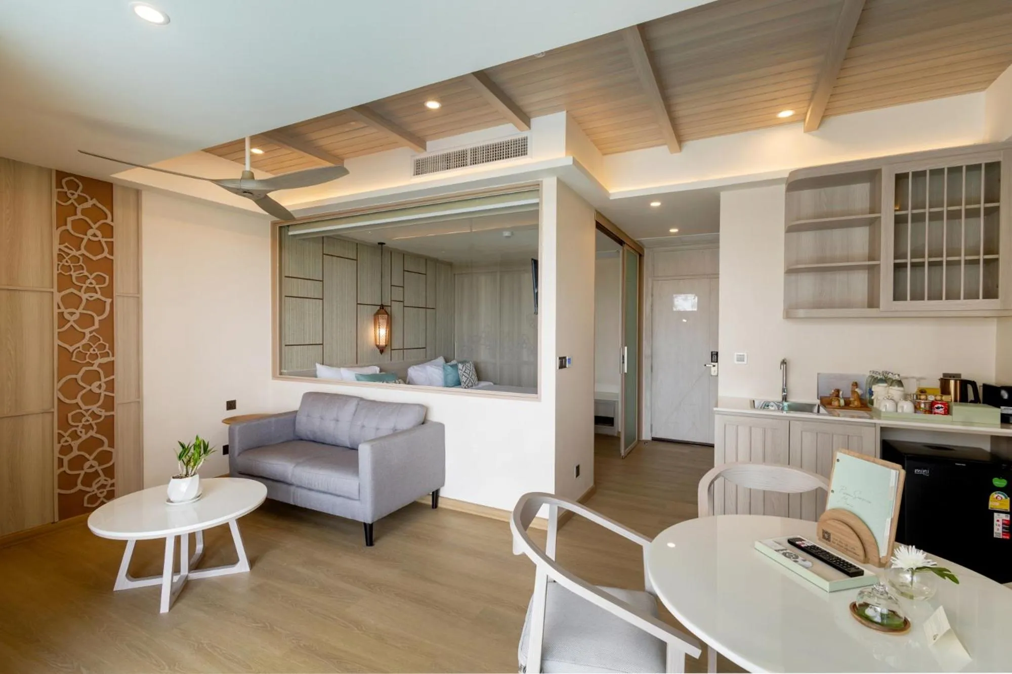 Living room, Bed in The Little Shore Khao Lak by Katathani