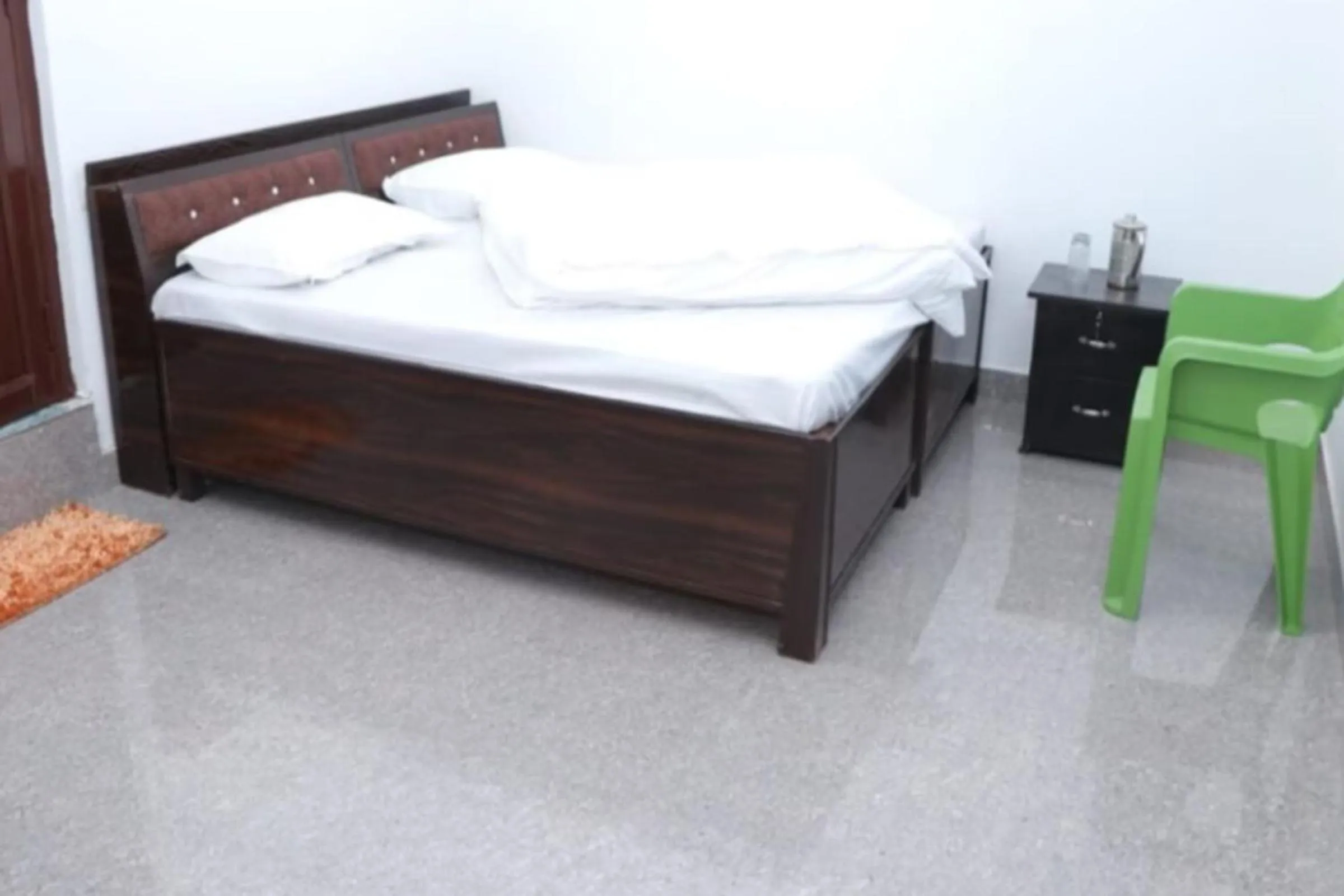 Bedroom, Bed in Hotel Prakash by StayApart