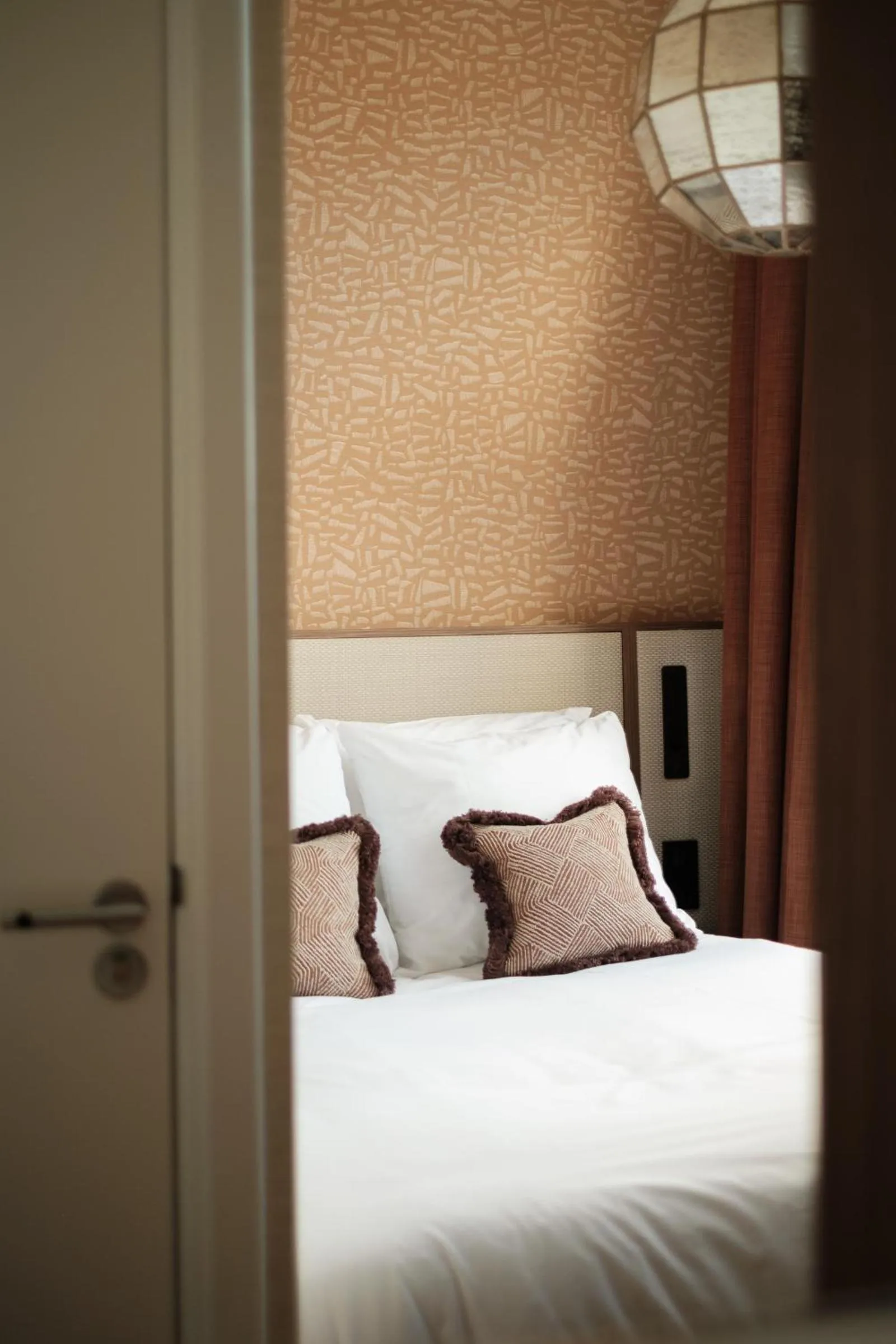 Bed in Parklane Hotel