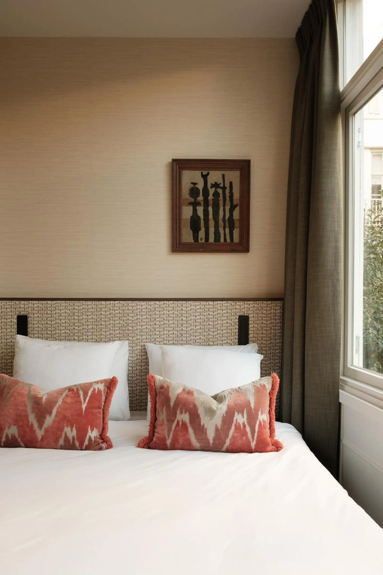 Bed in Parklane Hotel