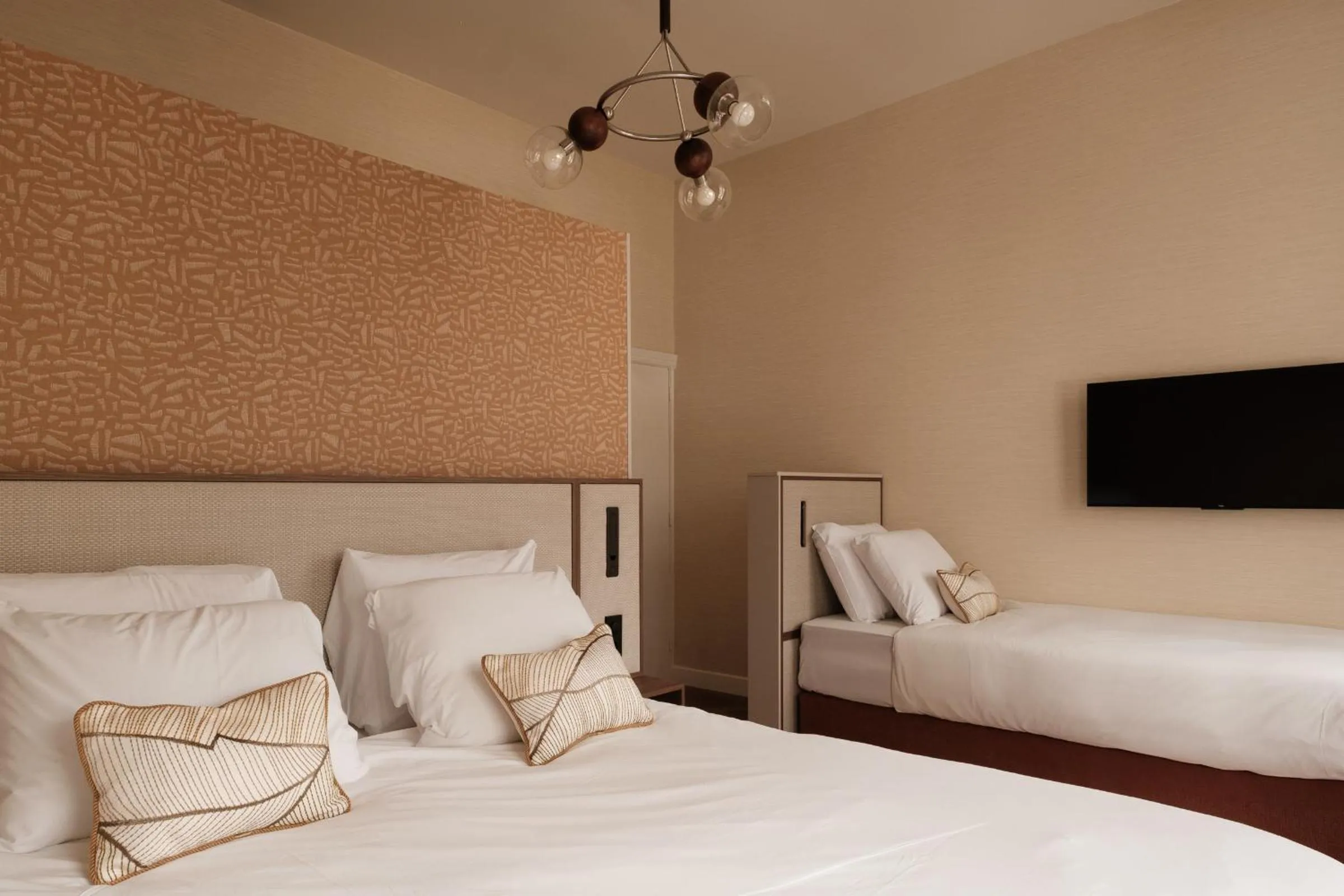 Bed in Parklane Hotel