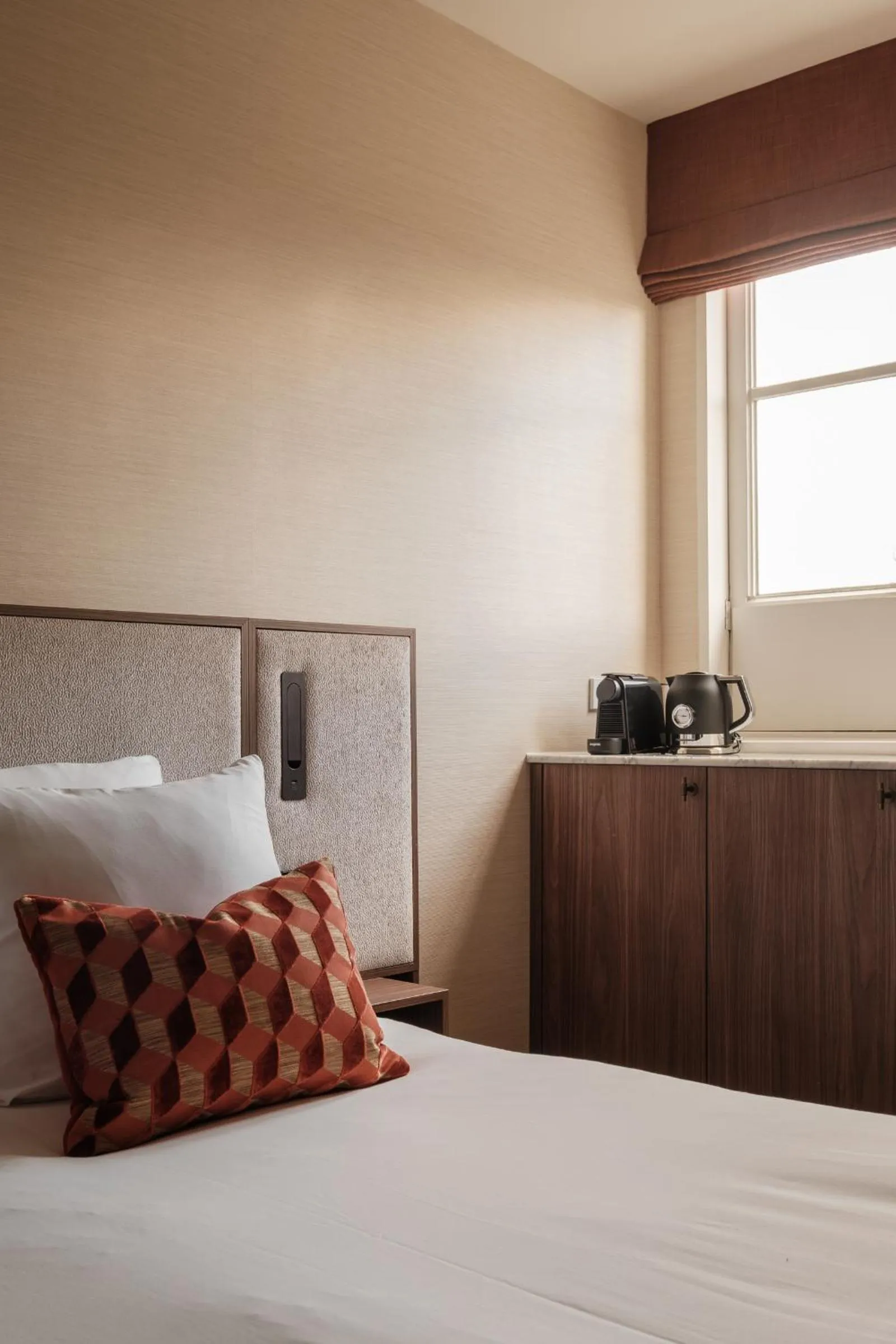 Bed in Parklane Hotel