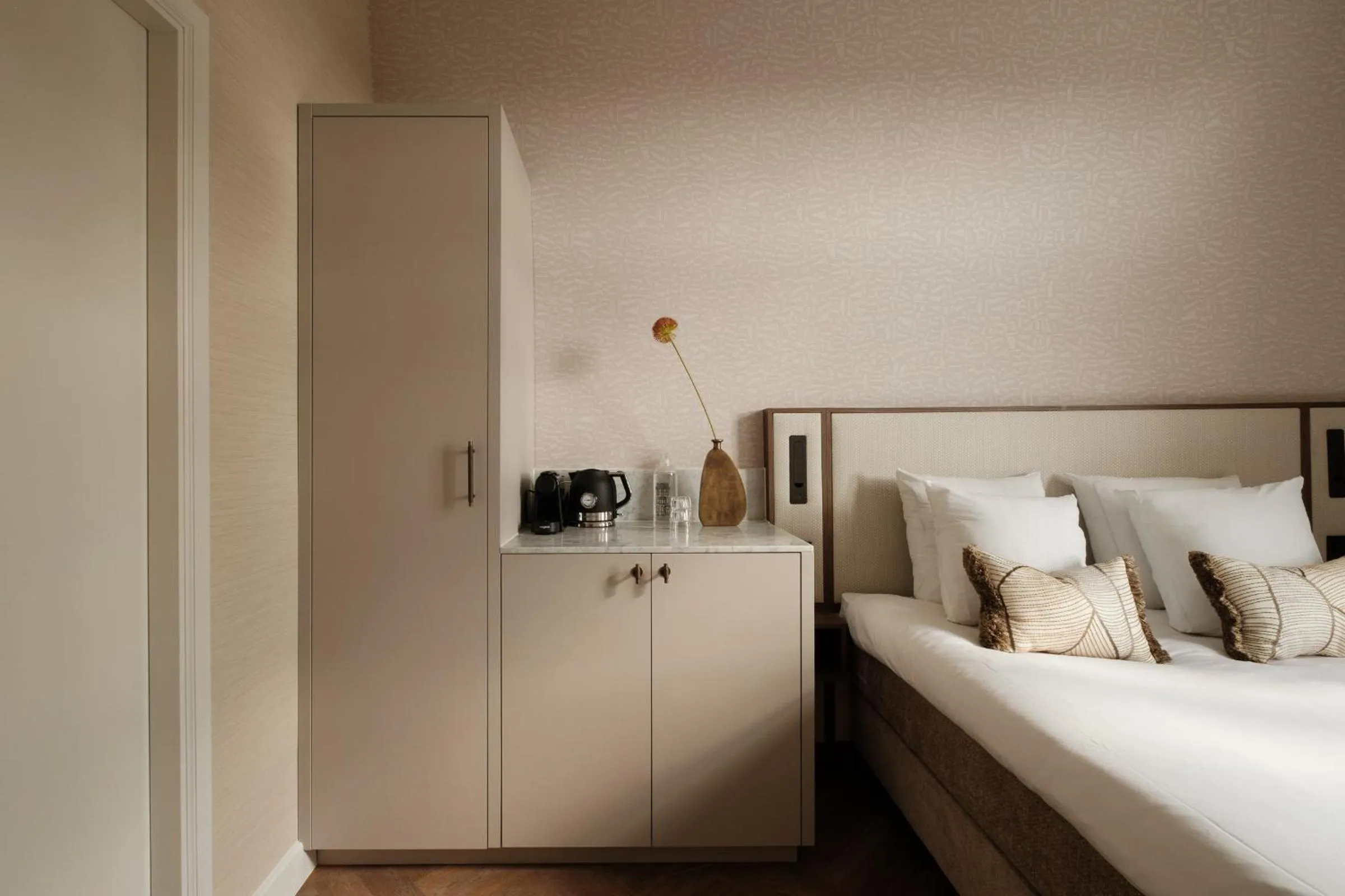 Bed in Parklane Hotel