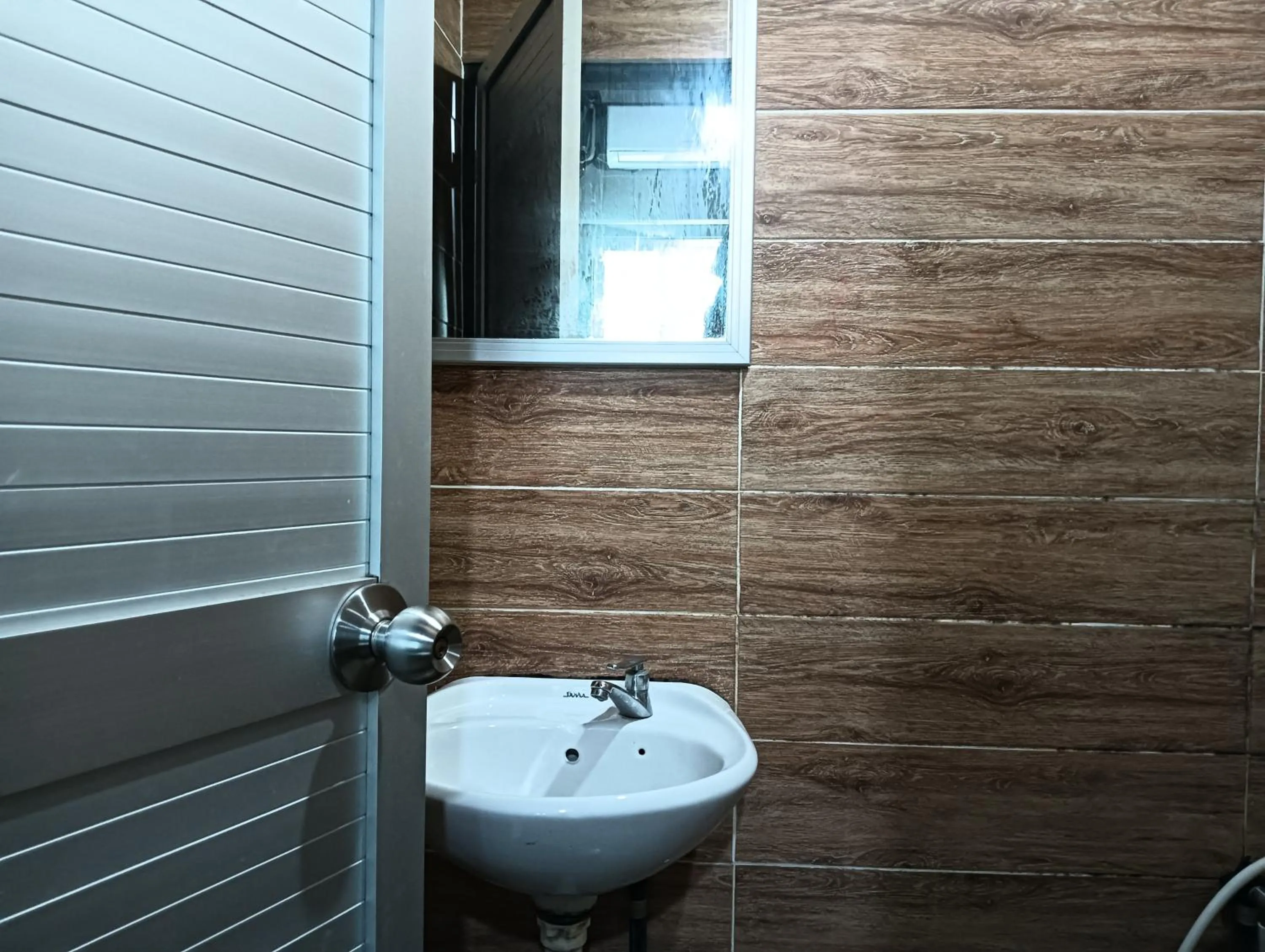 Bathroom in Hotel O Hi Inn 2