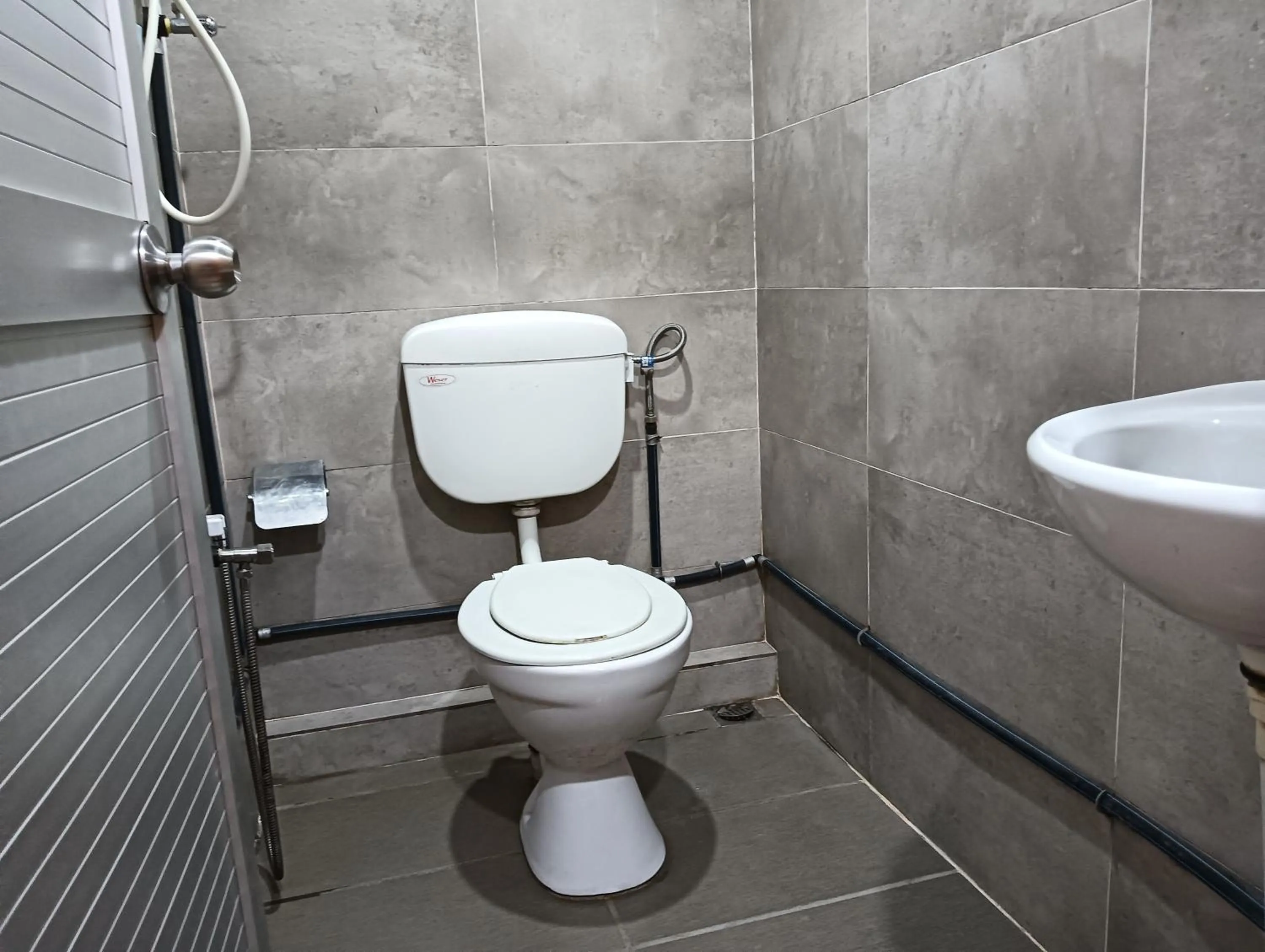 Bathroom in Hotel O Hi Inn 2