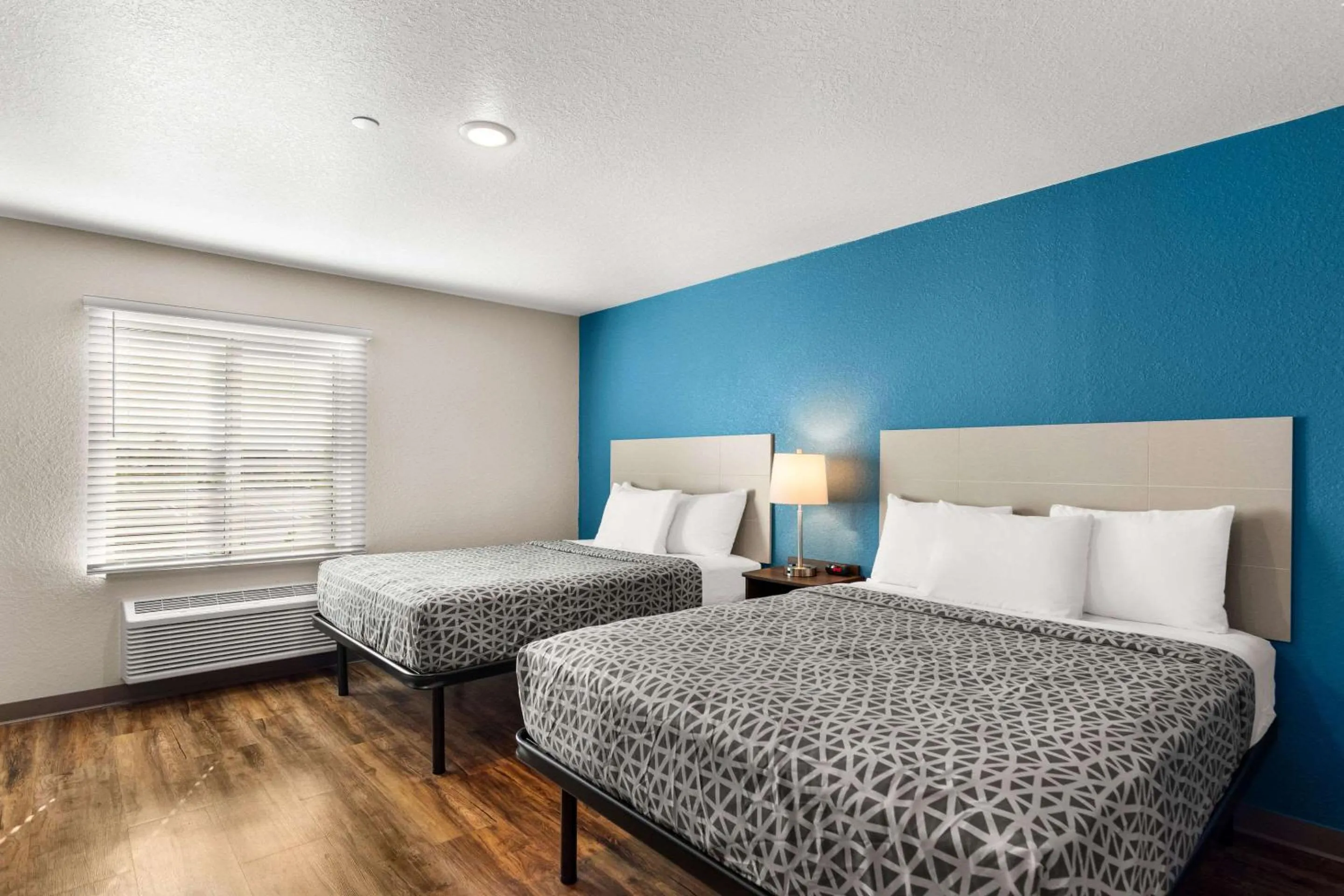 Bedroom, Bed in WoodSpring Suites Port St Lucie