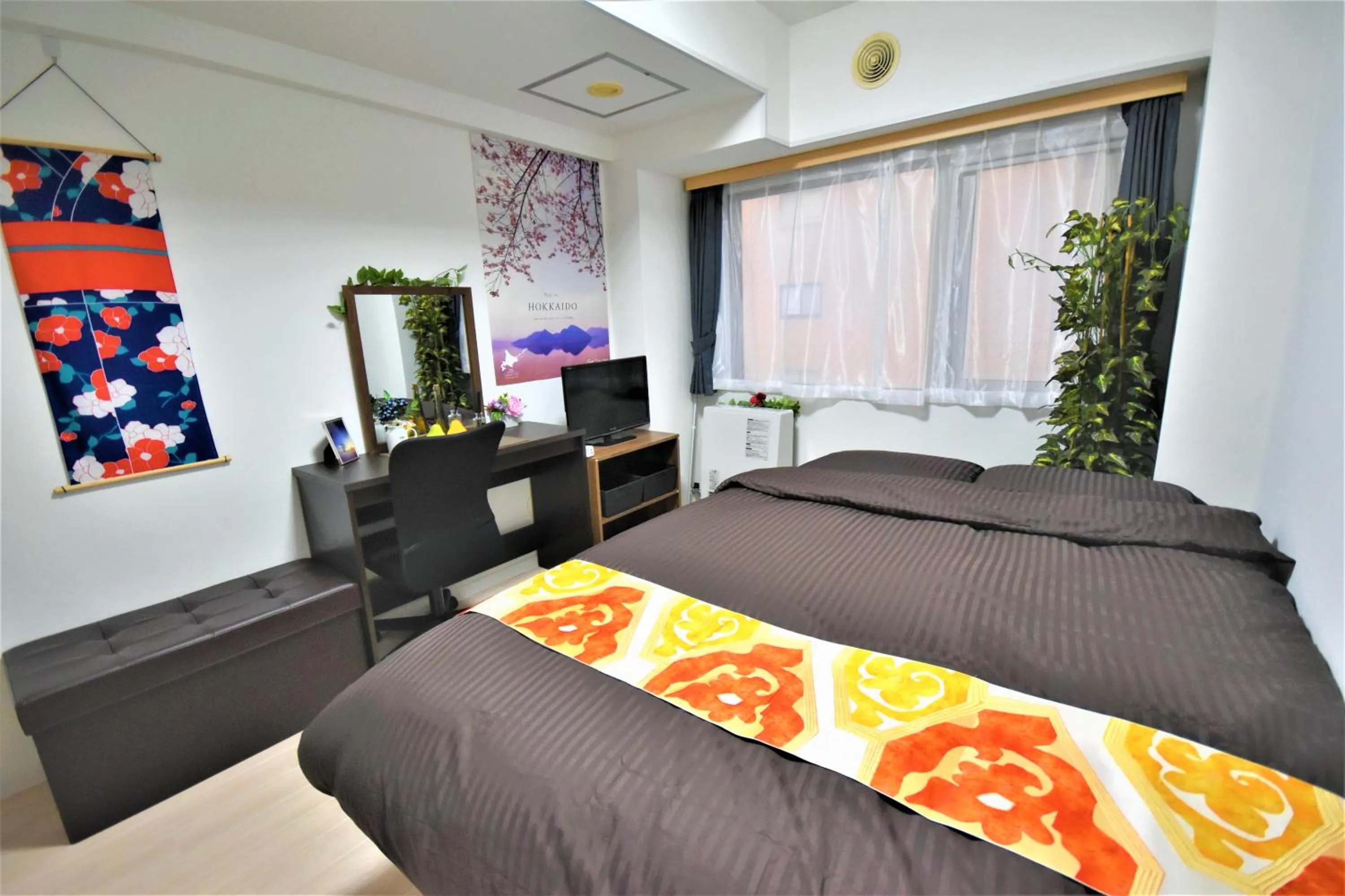 Photo of the whole room, Bed in KIYAZA City Sapporo CALIDO