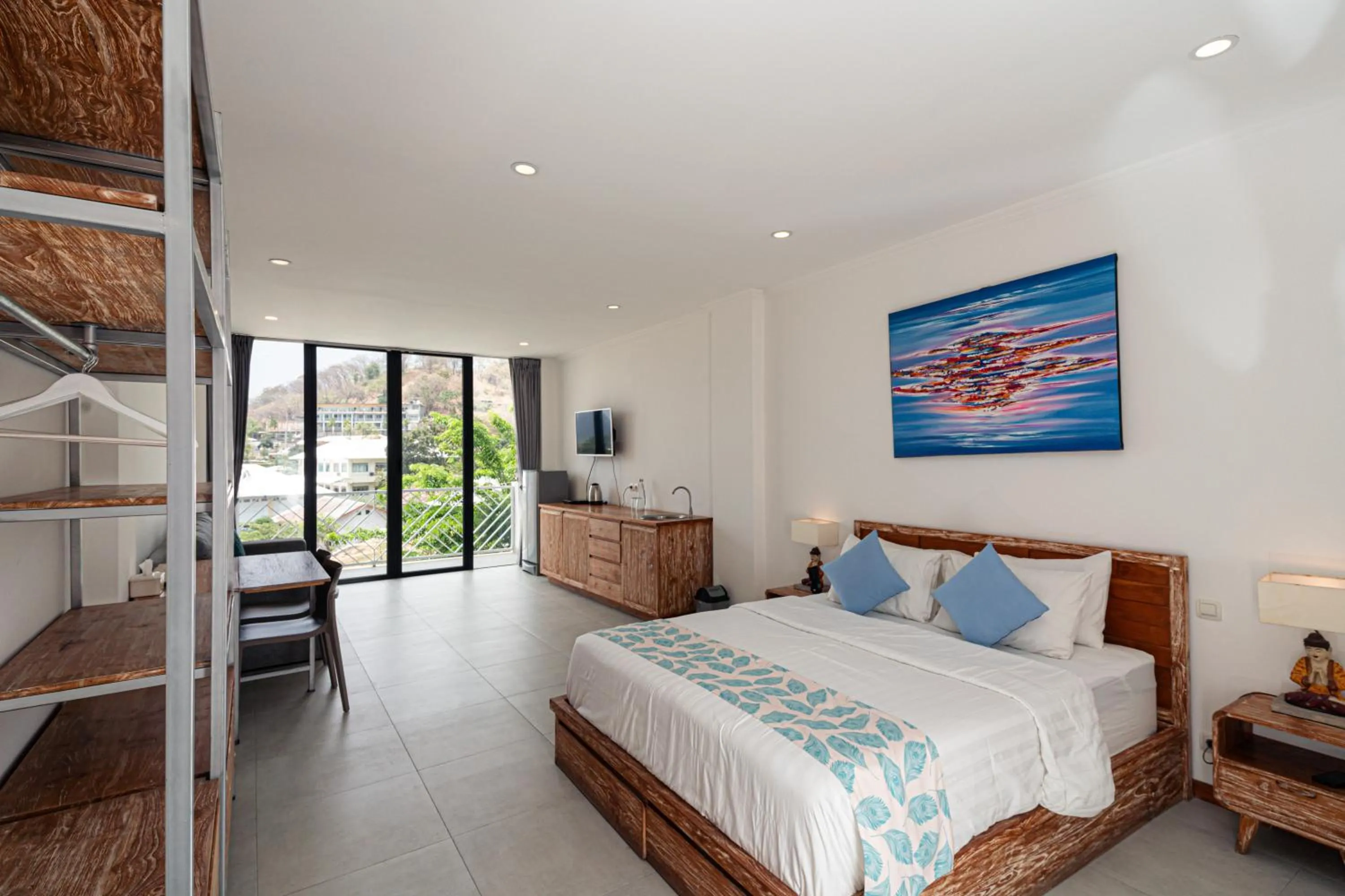 Bed in Komodo Suites Downtown