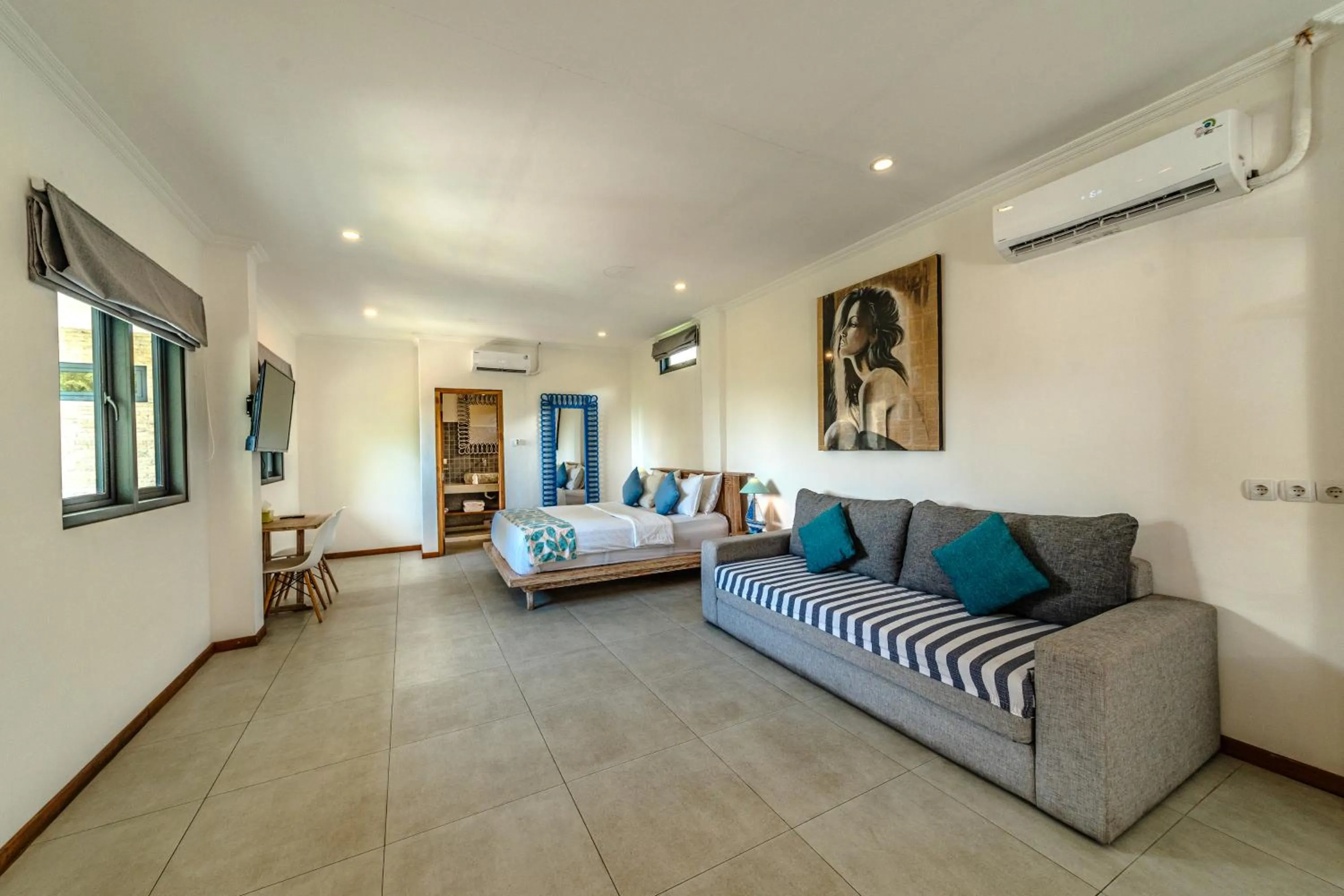 Bed in Komodo Suites Downtown