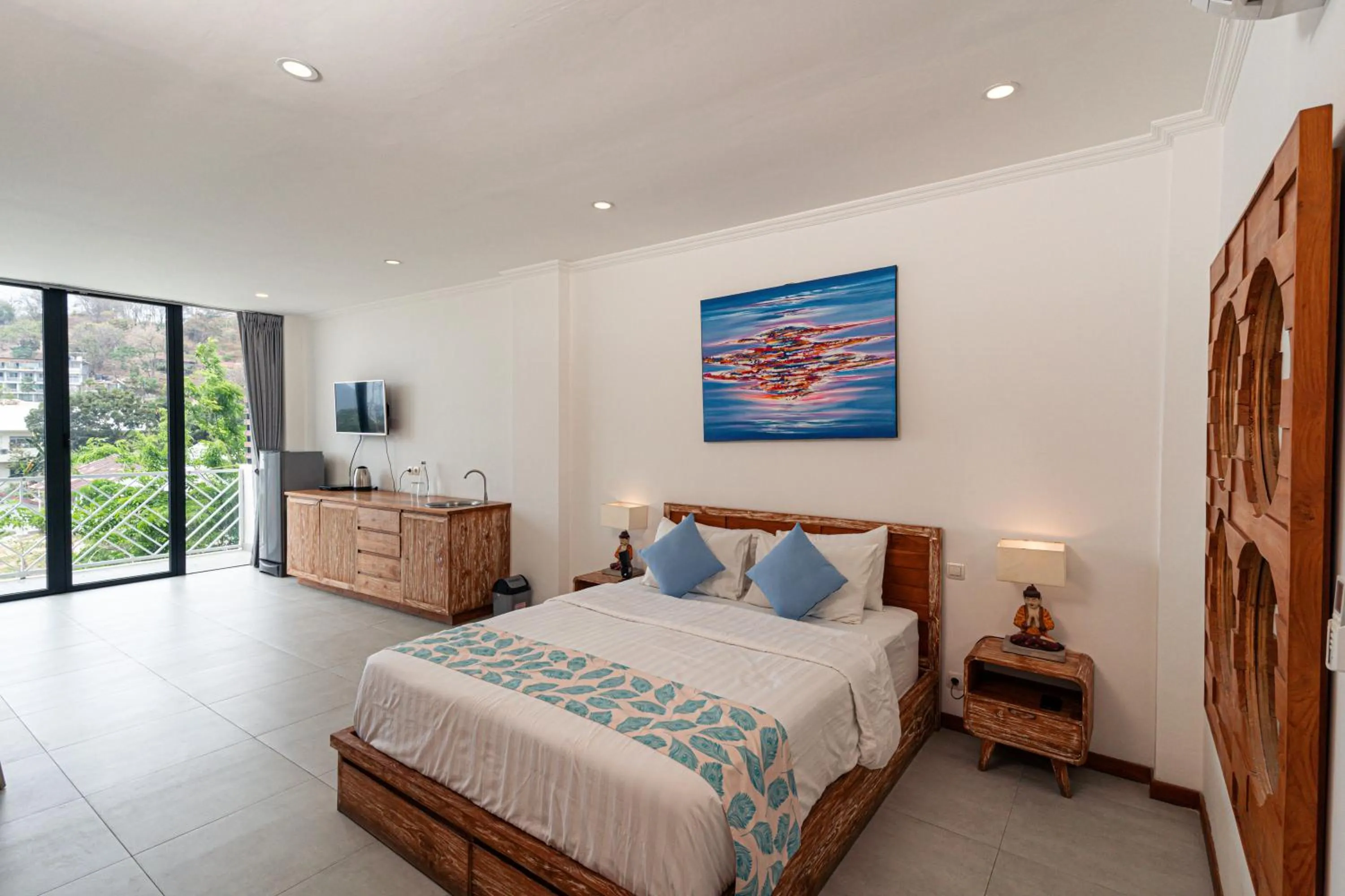 Living room, Bed in Komodo Suites Downtown