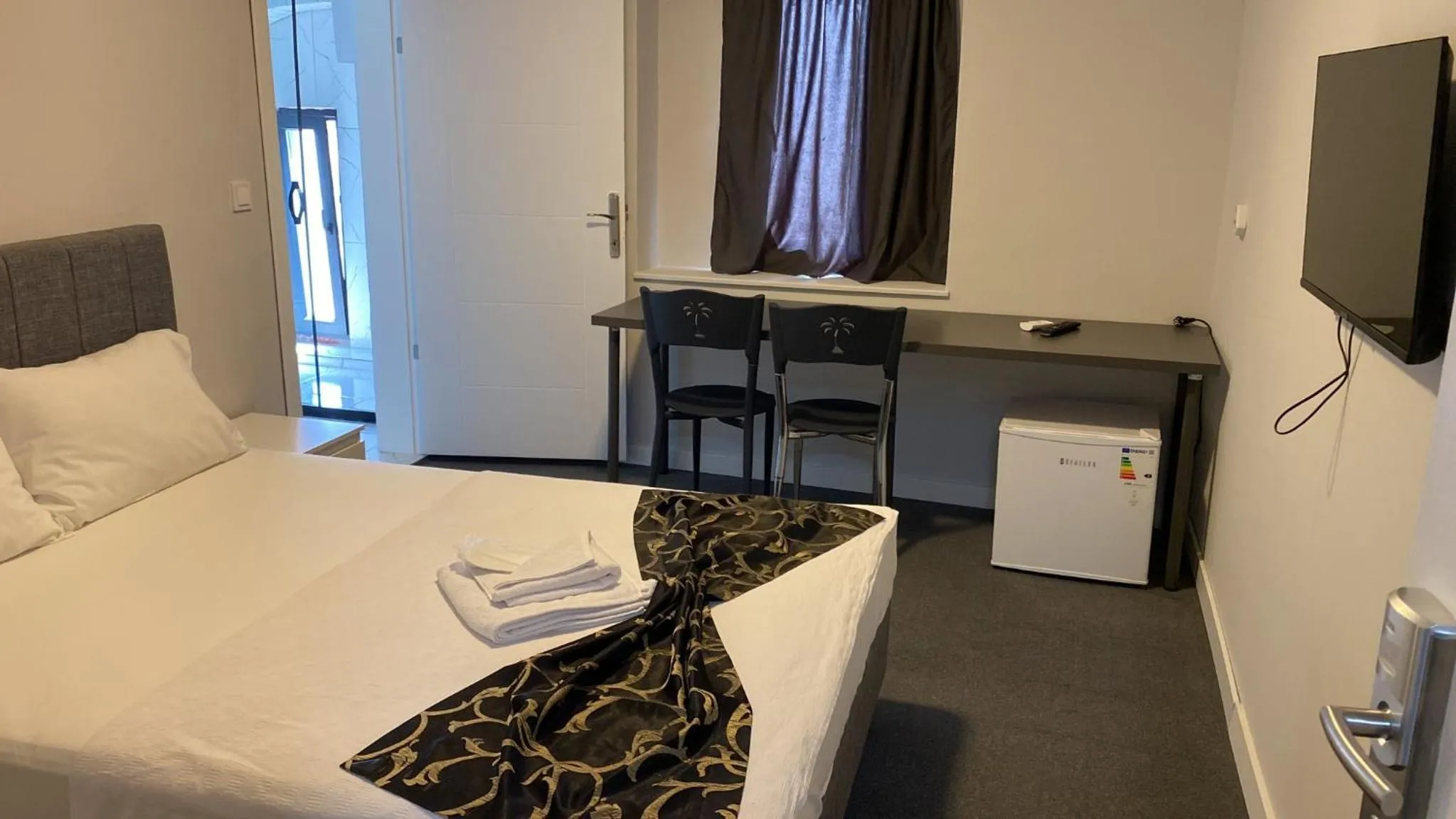 Bed in RED FLAG HOTEL