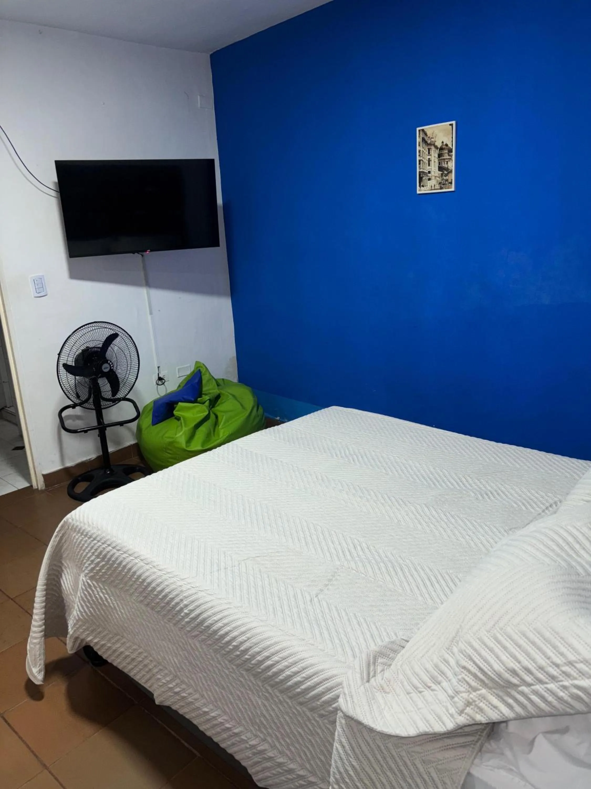 Bed in OUR HOME SAN ANTONIO