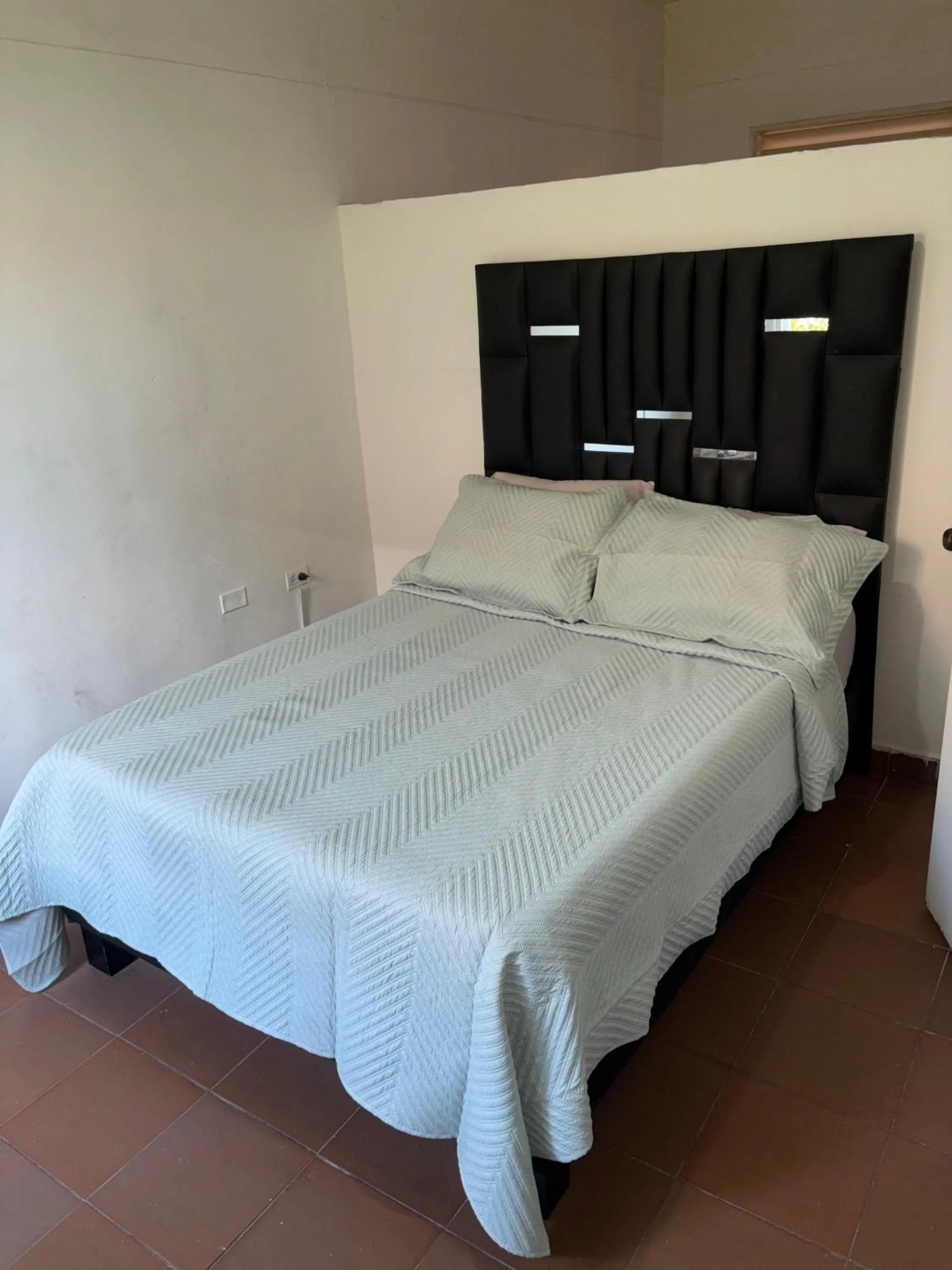 Bed in OUR HOME SAN ANTONIO