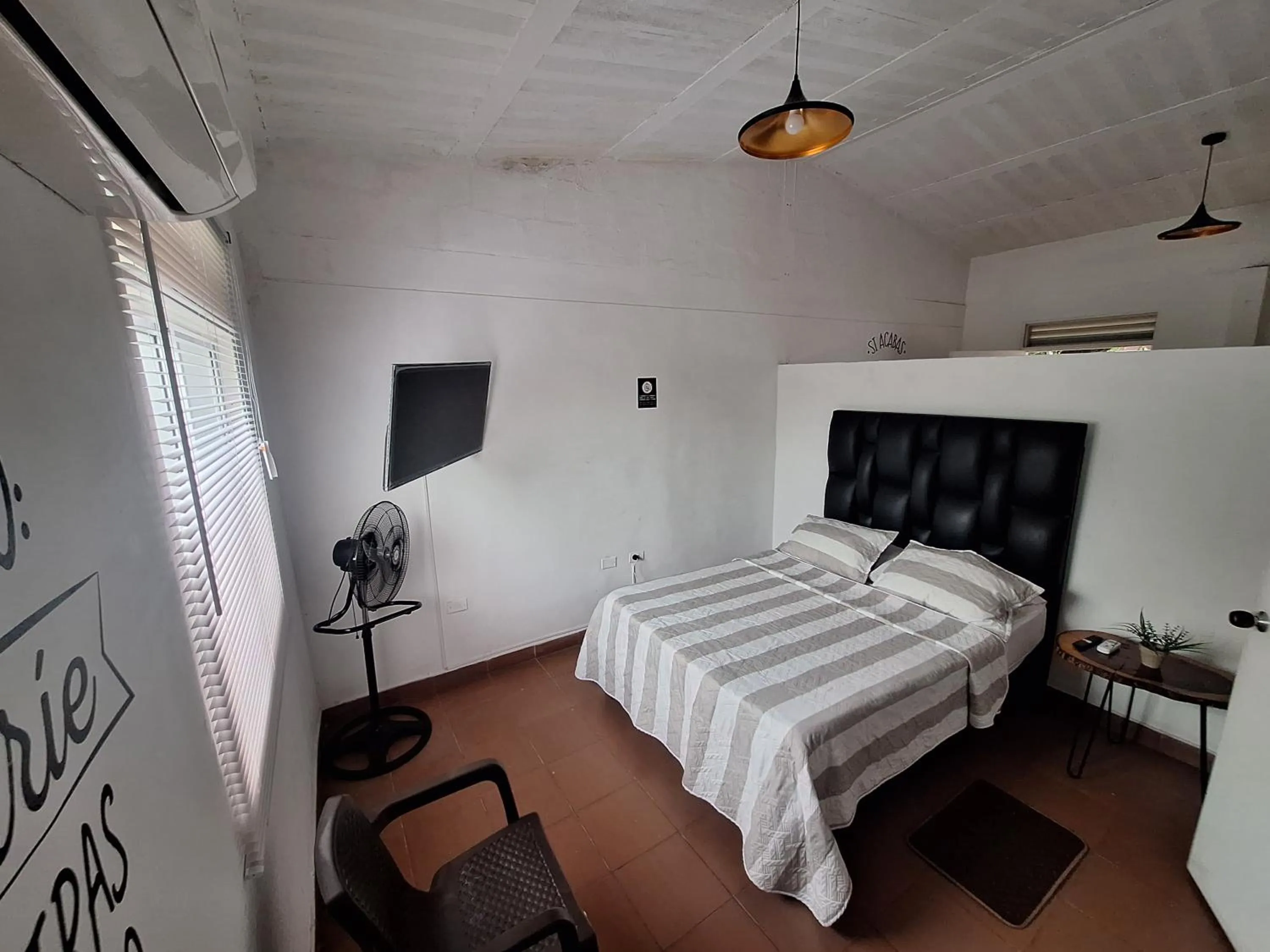 Bed in OUR HOME SAN ANTONIO