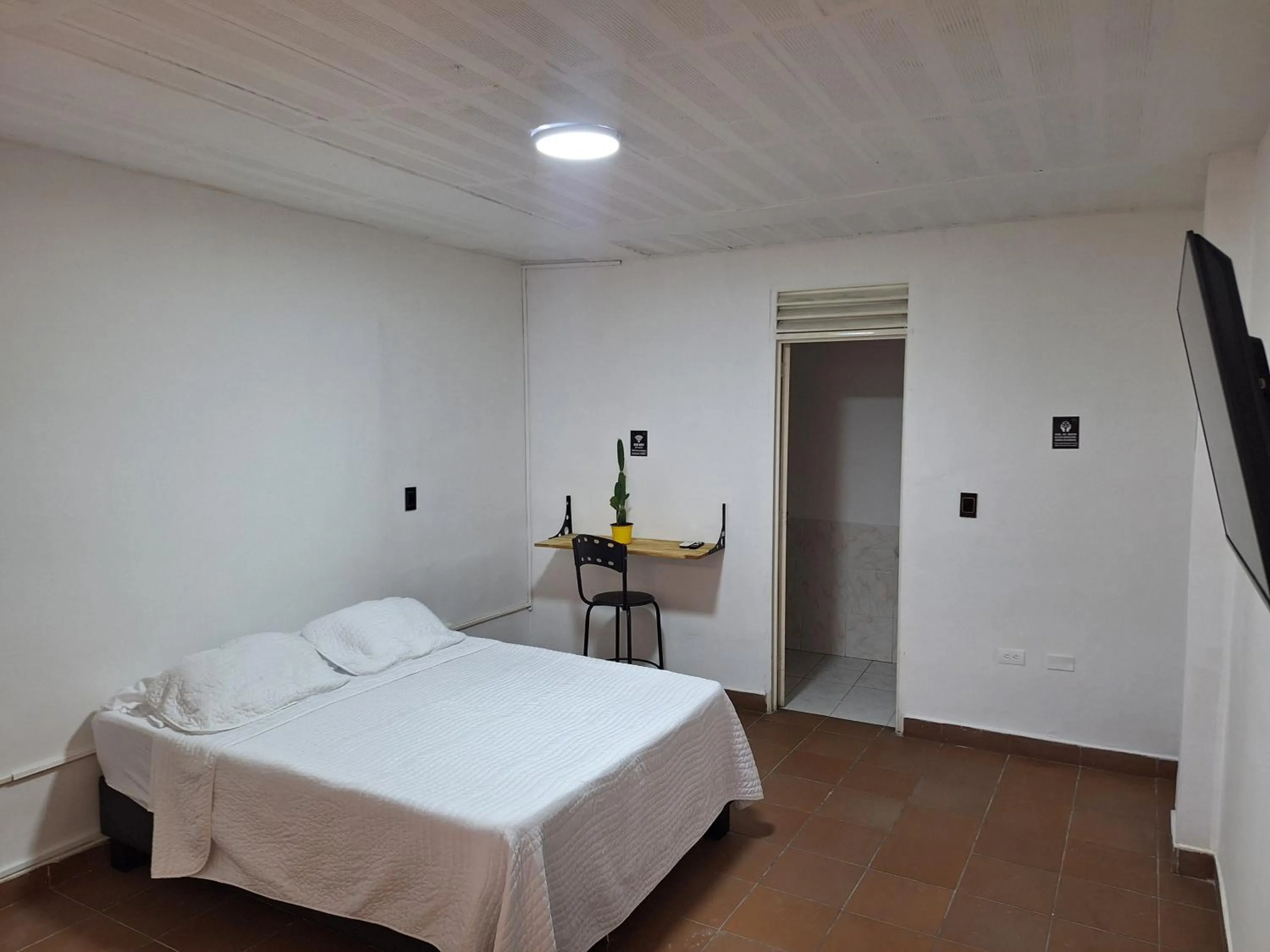 Bed in OUR HOME SAN ANTONIO