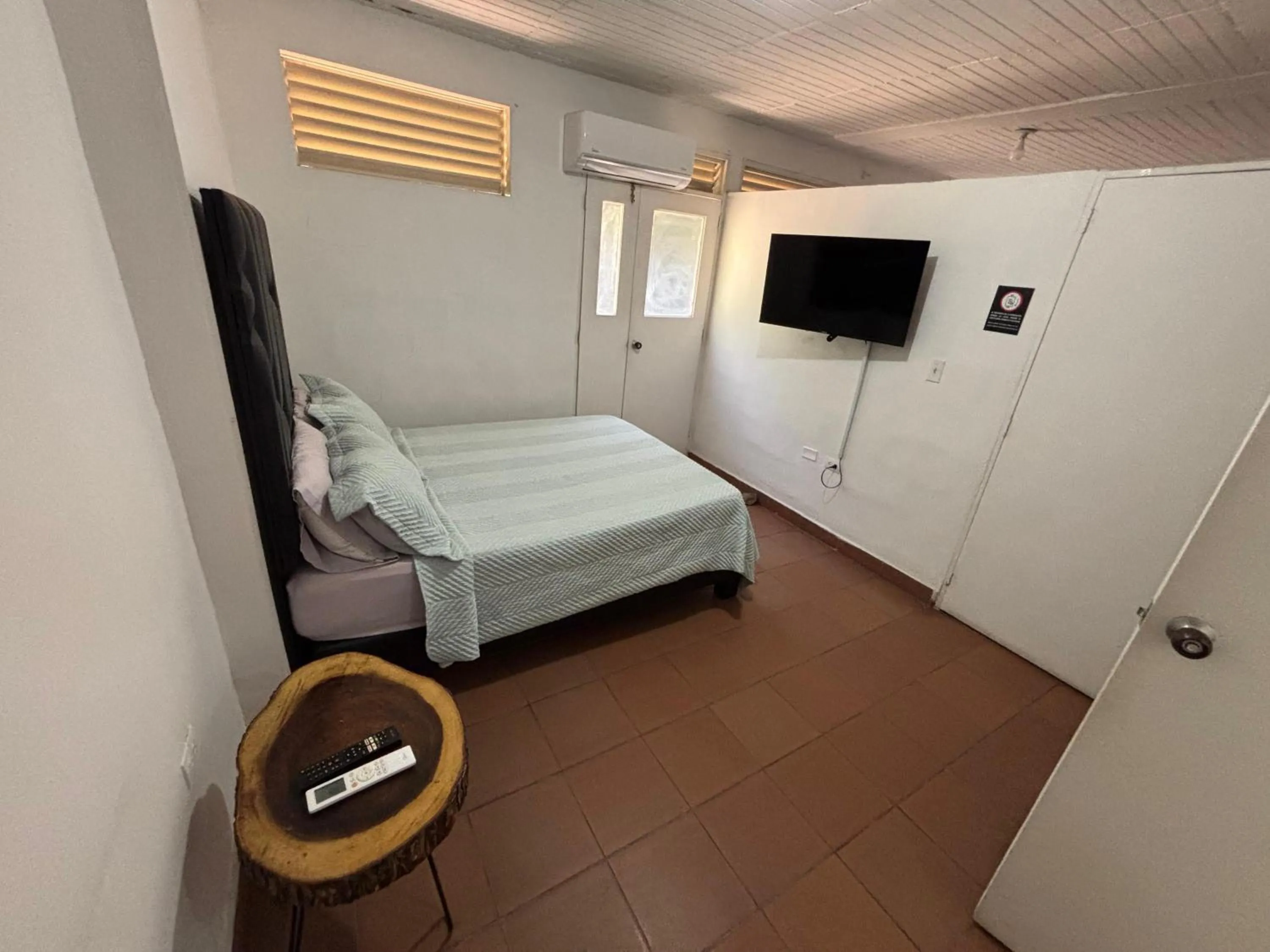 Bed in OUR HOME SAN ANTONIO