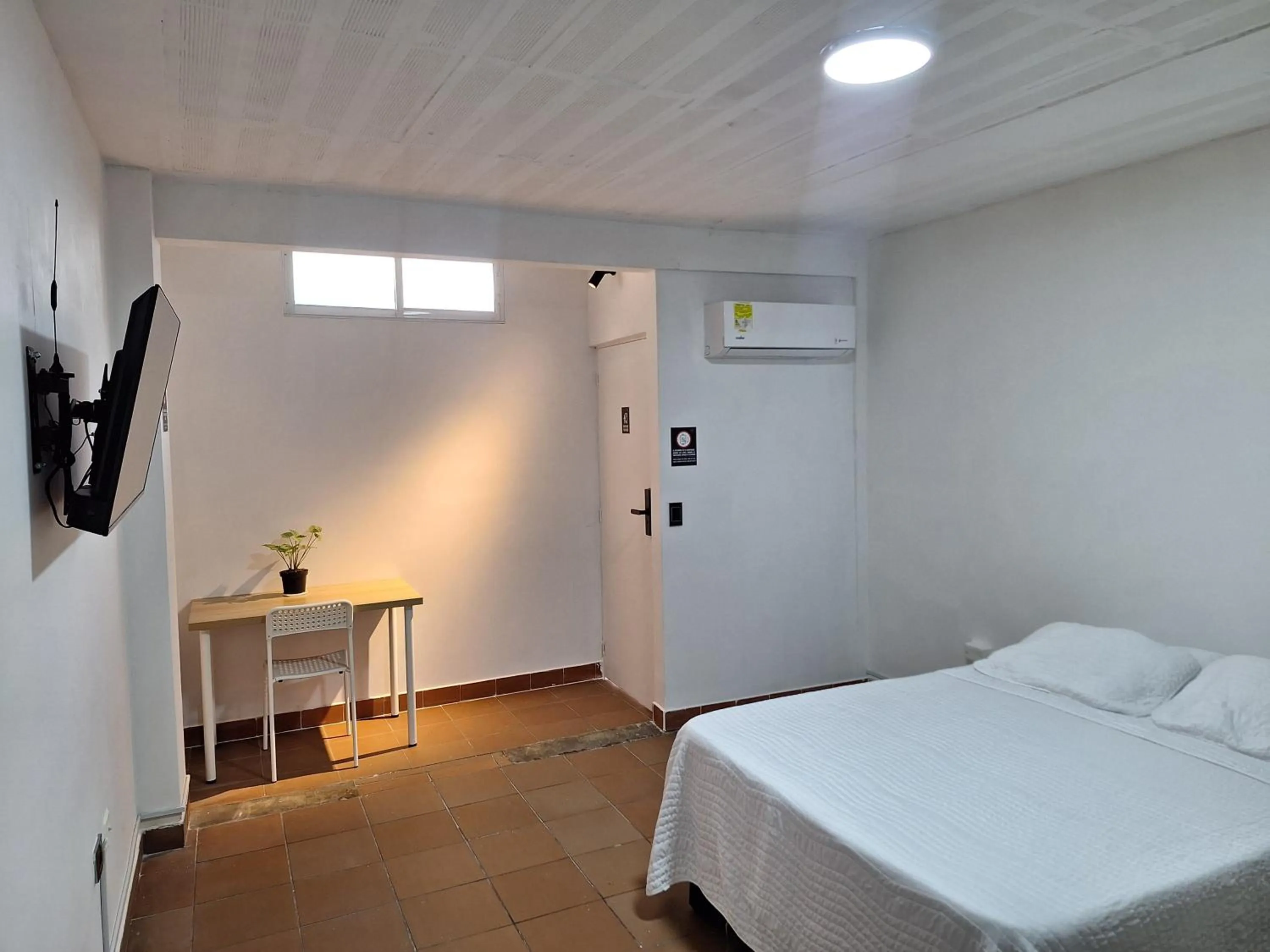 Bed in OUR HOME SAN ANTONIO