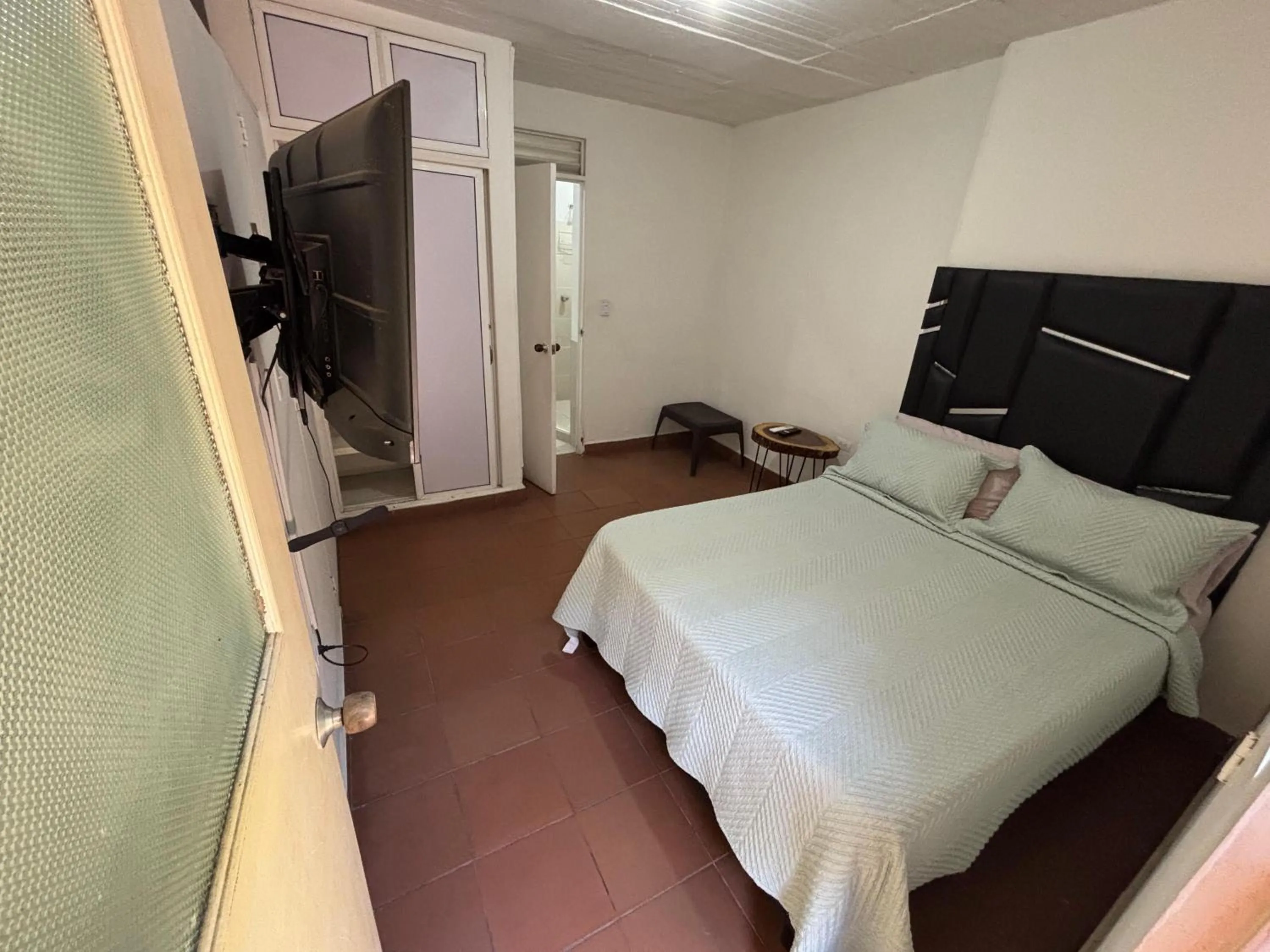 Bed in OUR HOME SAN ANTONIO