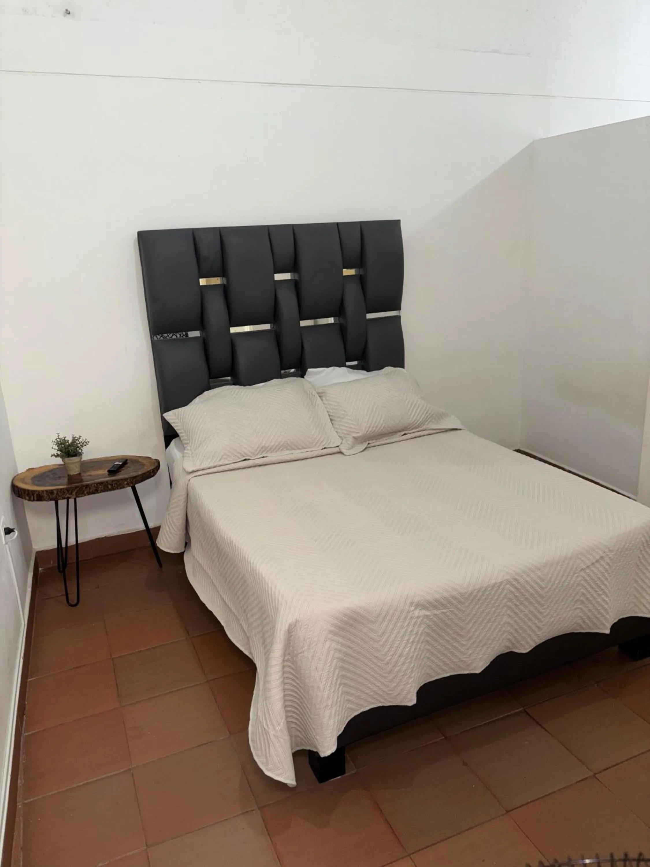 Bed in OUR HOME SAN ANTONIO