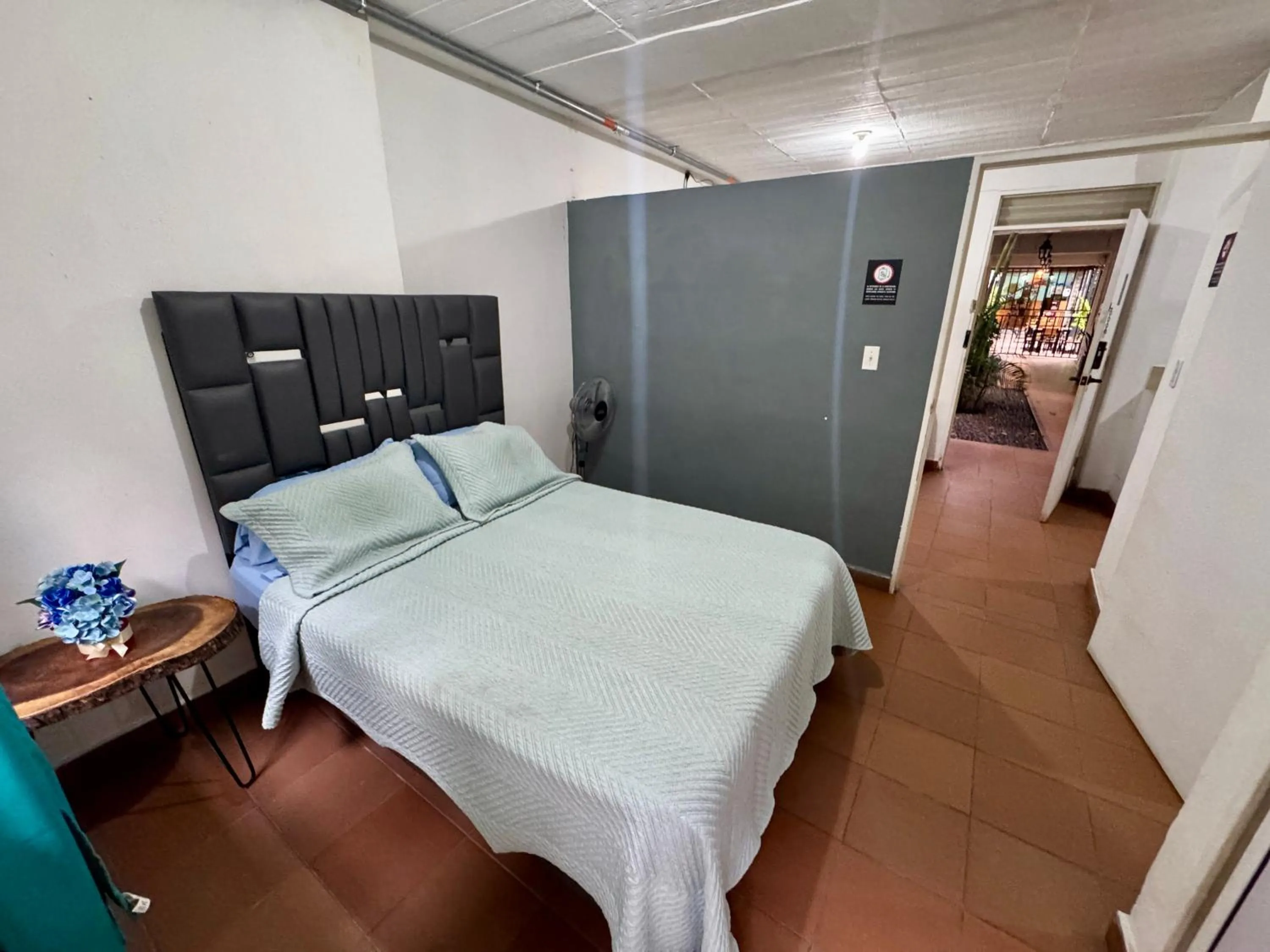 Bed in OUR HOME SAN ANTONIO