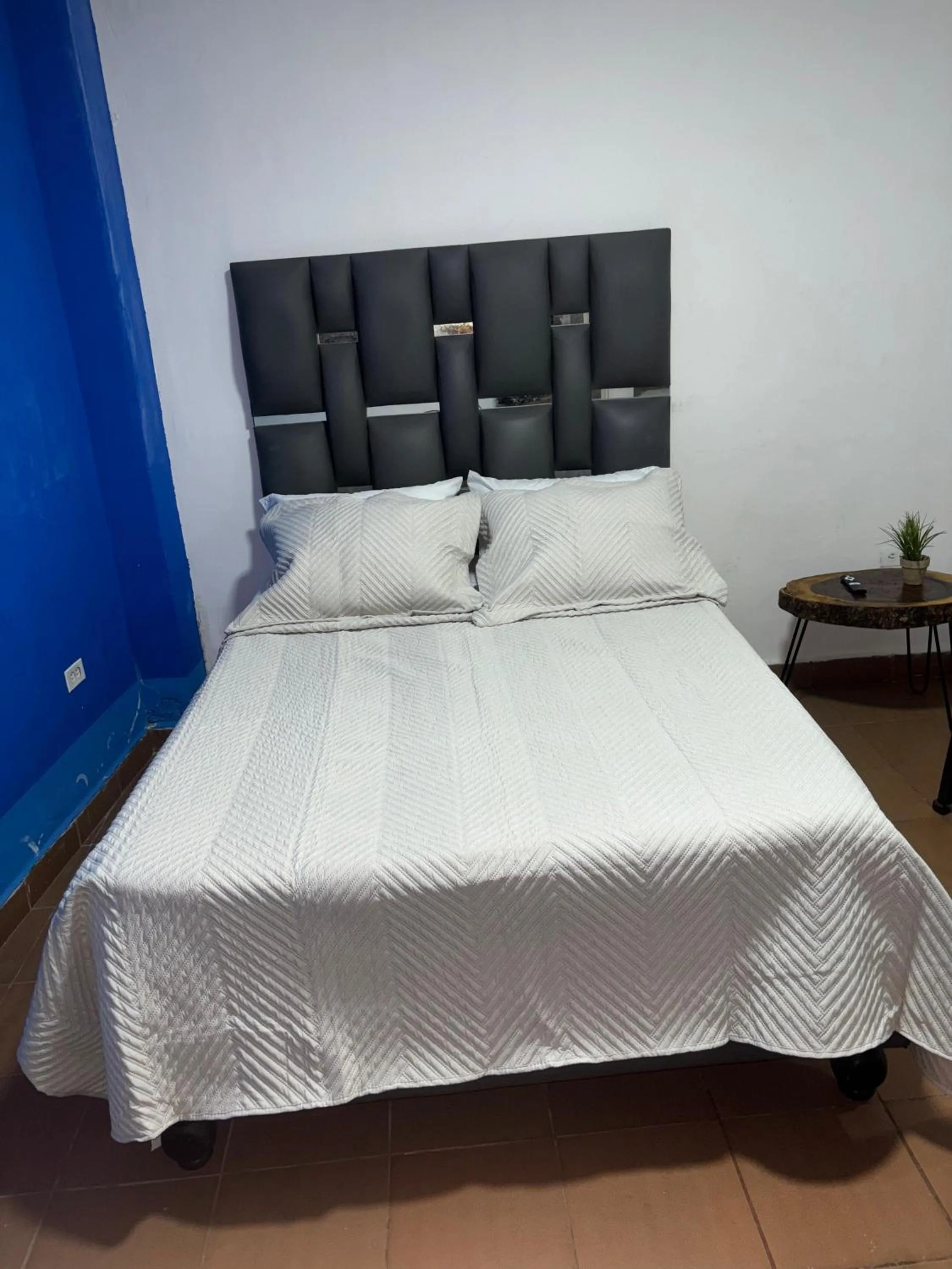 Bed in OUR HOME SAN ANTONIO